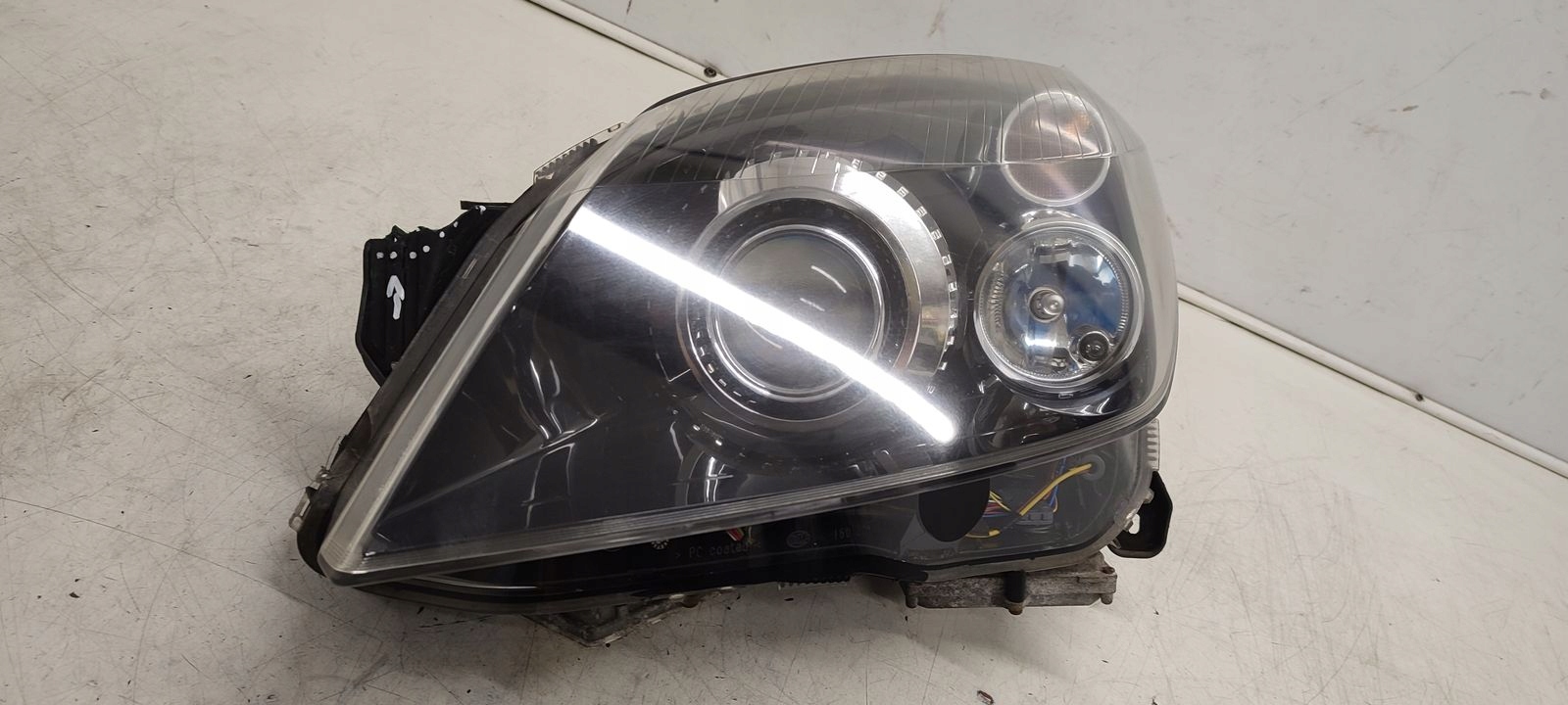 light front front left xenon positioning Opel Astra H