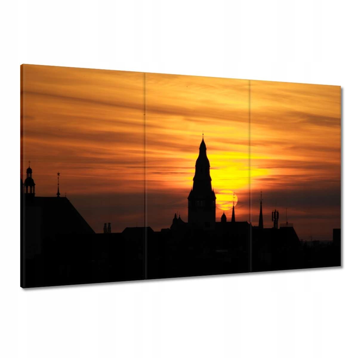 Obrazy 120x80 Zapadající slunce nad střechami ve městě