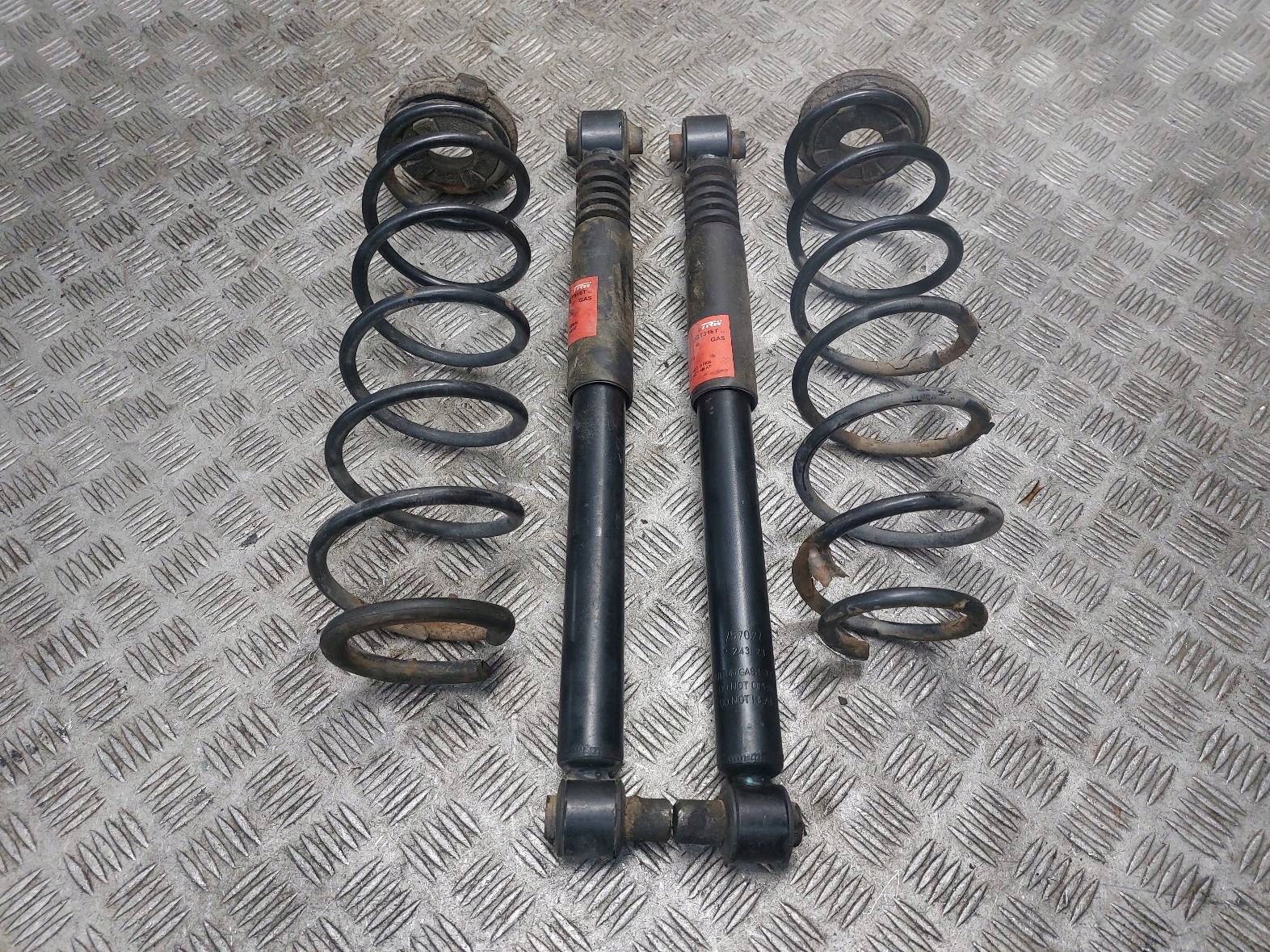 shock absorber + spring left rear part + right rear part RENAULT LAGUNA II