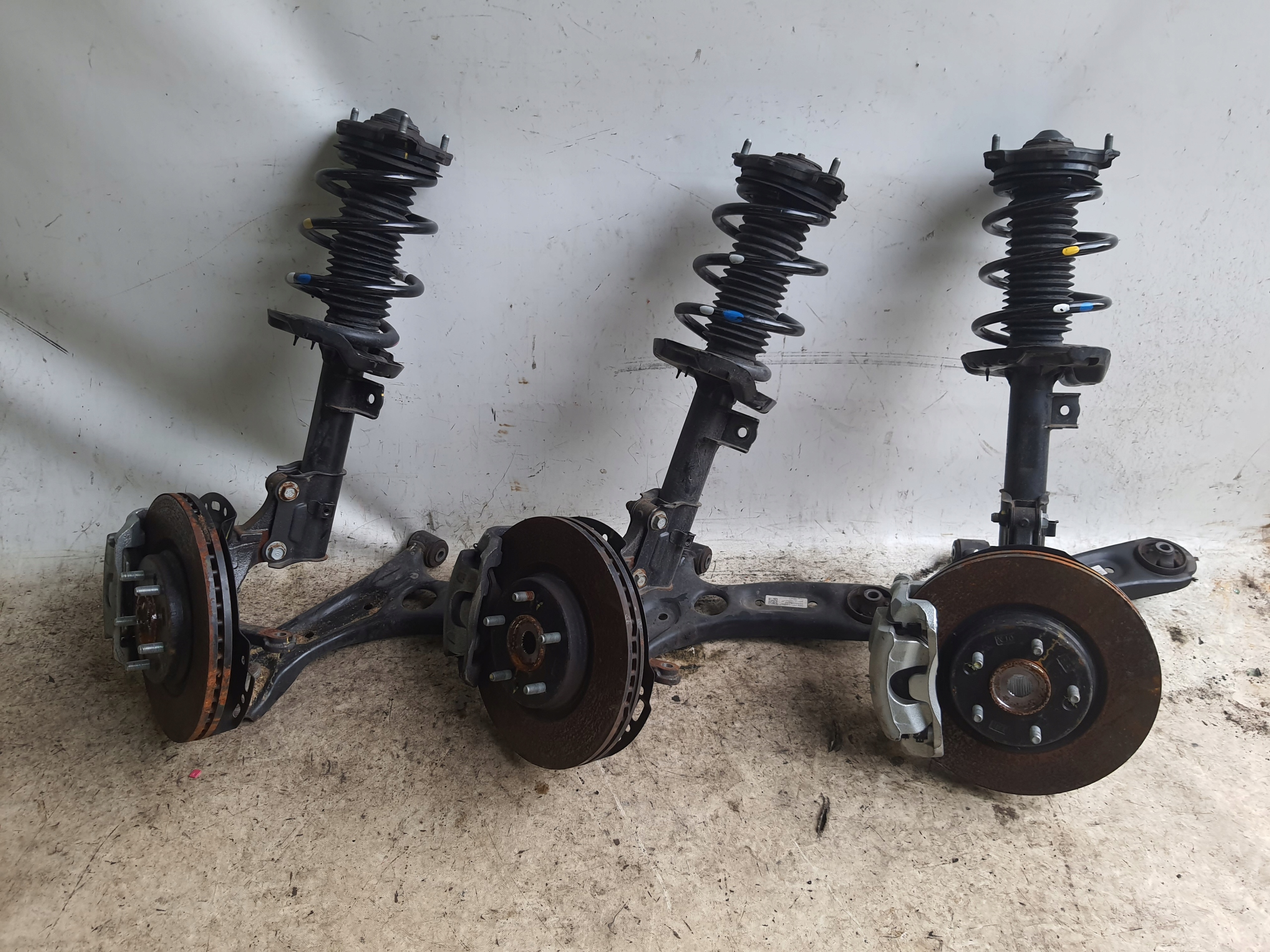 KIA XCEED 19-> MACPHERSO swing arm left