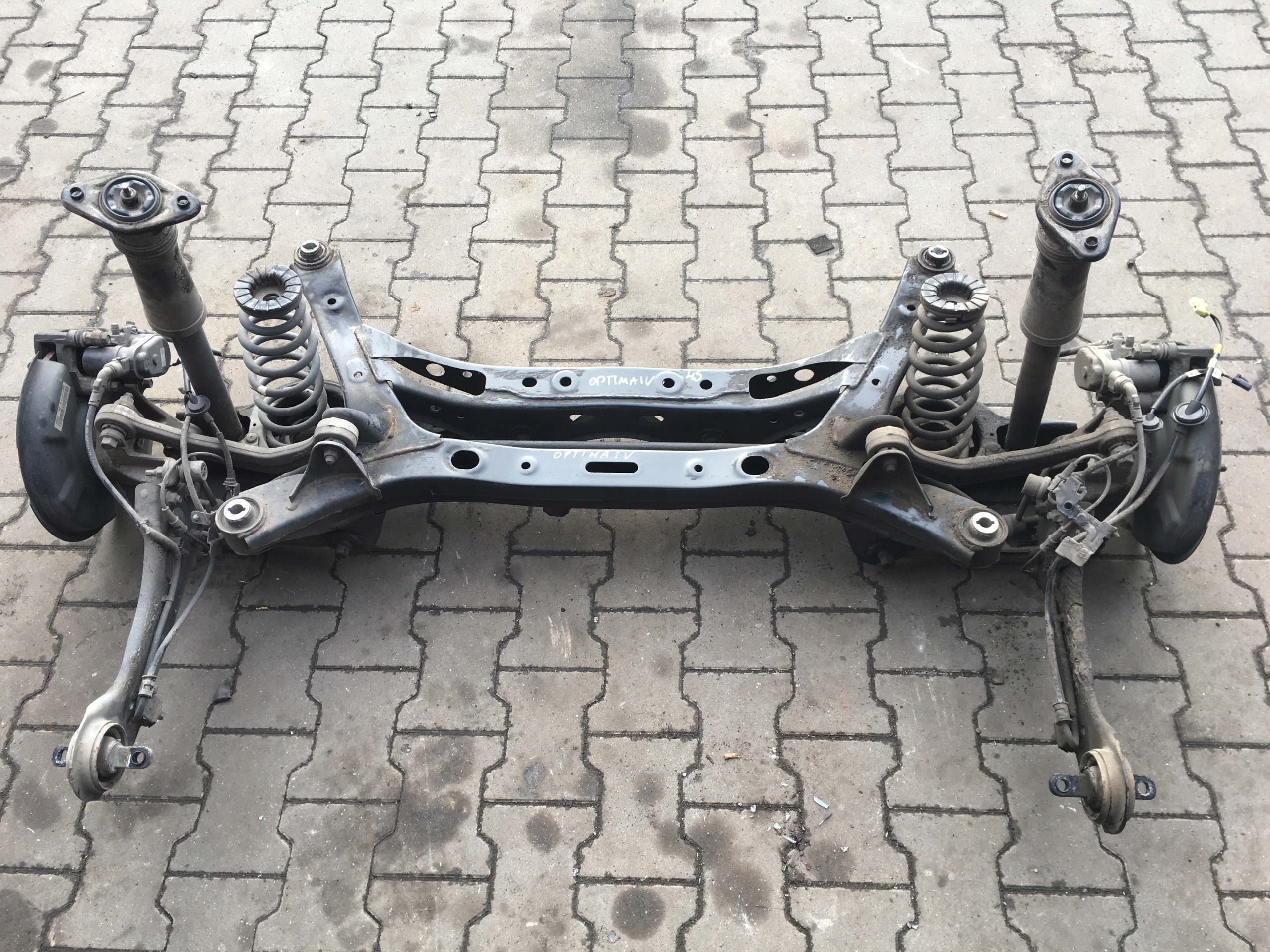 KIA OPTIMA IV 15-20 BELKA ZAWIESZENIA TYLNA TYŁ