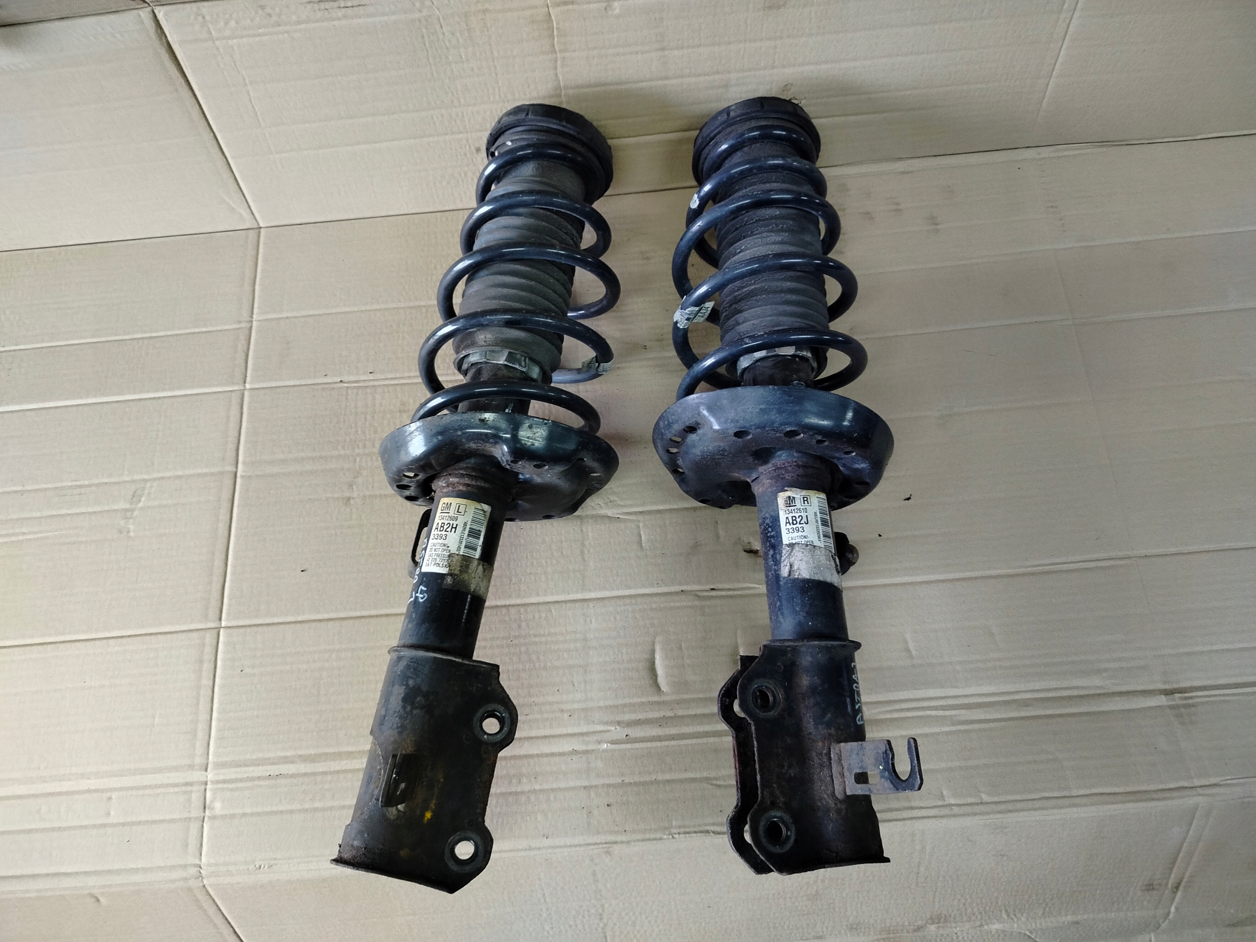 OPEL ASTRA J shock absorber McPherson left front 13412609