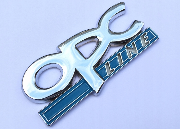 EMBLEMAT ZNACZEK METALOWY OPC LINE NAKLEJANY Numer katalogowy części CCB-0