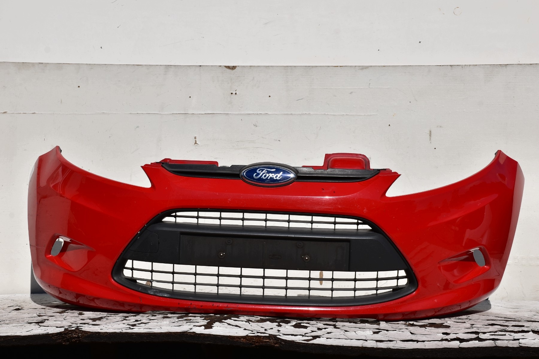 bumper front FORD FIESTA MK7 pre facelift 2008-2012 code lakieru: Colorado Red