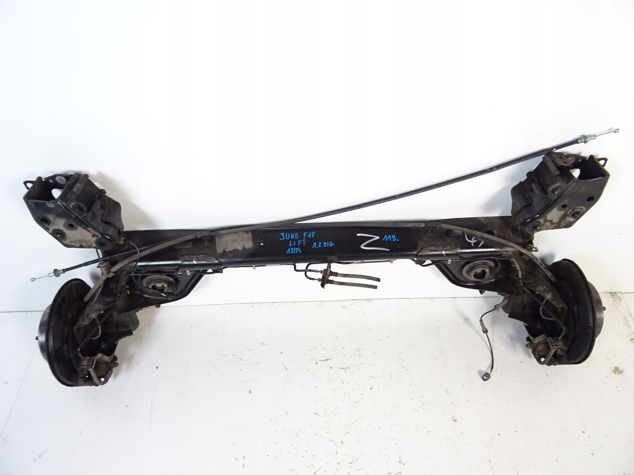 NISSAN JUKE LIFT 1.2 BENZYNA BELKA ZAWIESZENIA TYŁ TARCZE 2011-2019 Numer katalogowy części NISSAN JUKE LIFT 1.2 BENZYNA BELKA ZAWIESZENIA TYŁ TARCZE 2014-2019