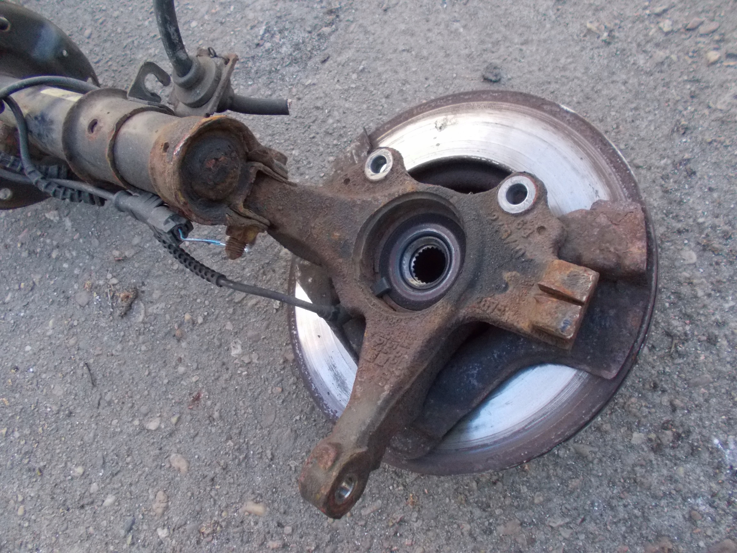 OPEL CORSA D 1.2 B 07R McPherson left front 13214353