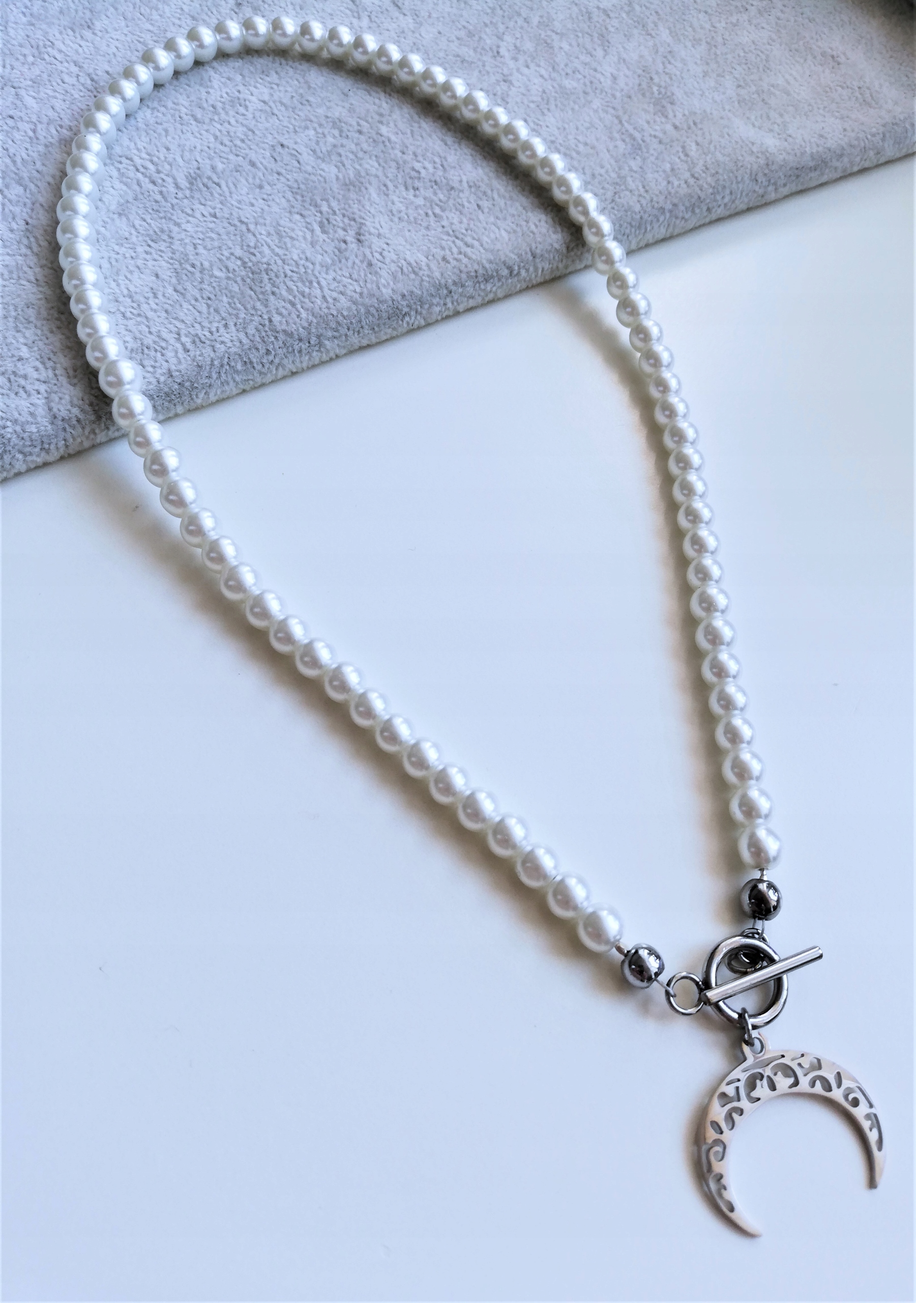 náhrdelník perly 50cm prolamovaný Roh Hojnost ocel