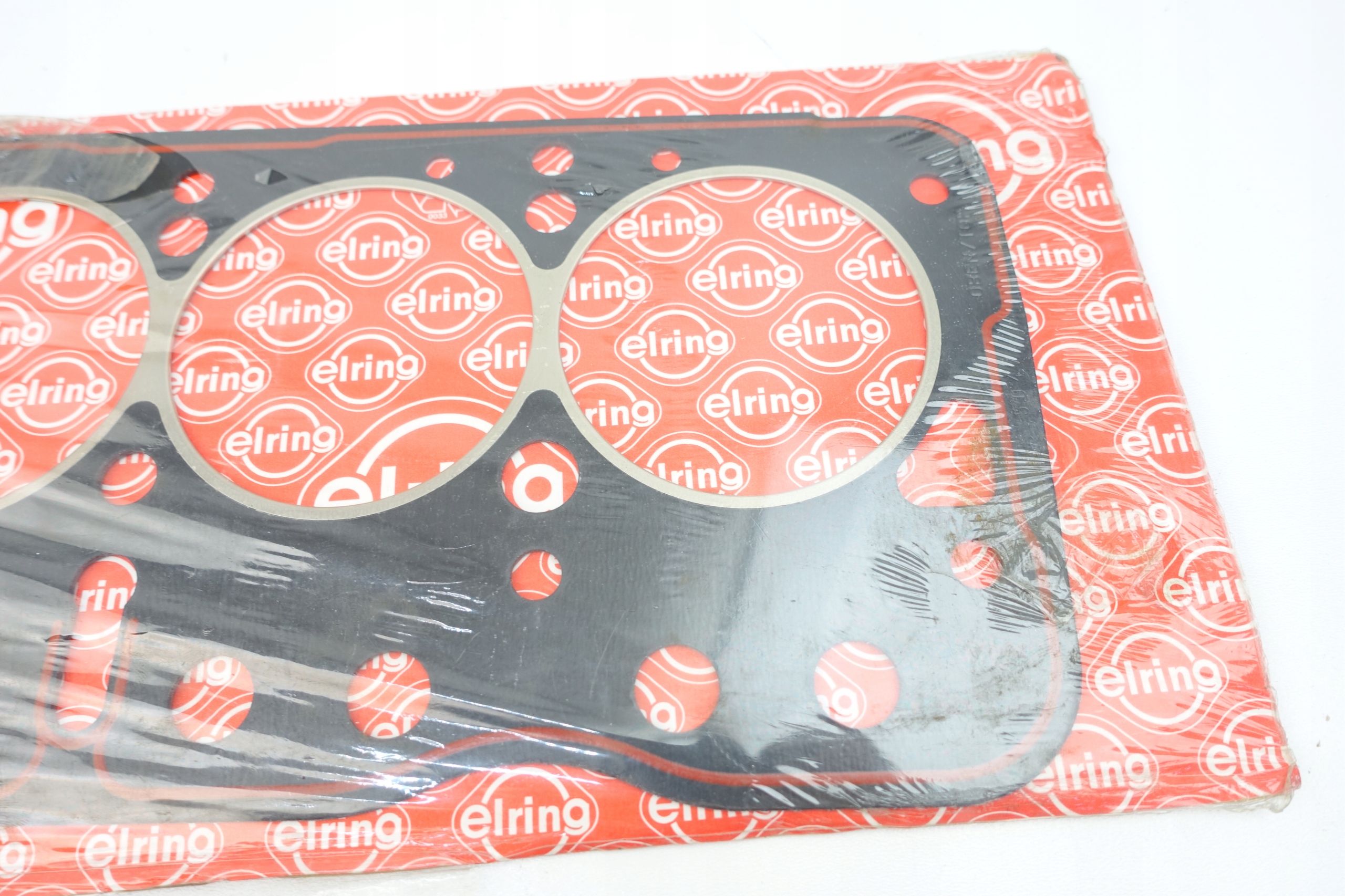 USZCZELKA GŁOWICY Ascona A Corsa A 607467 Producent części Elring