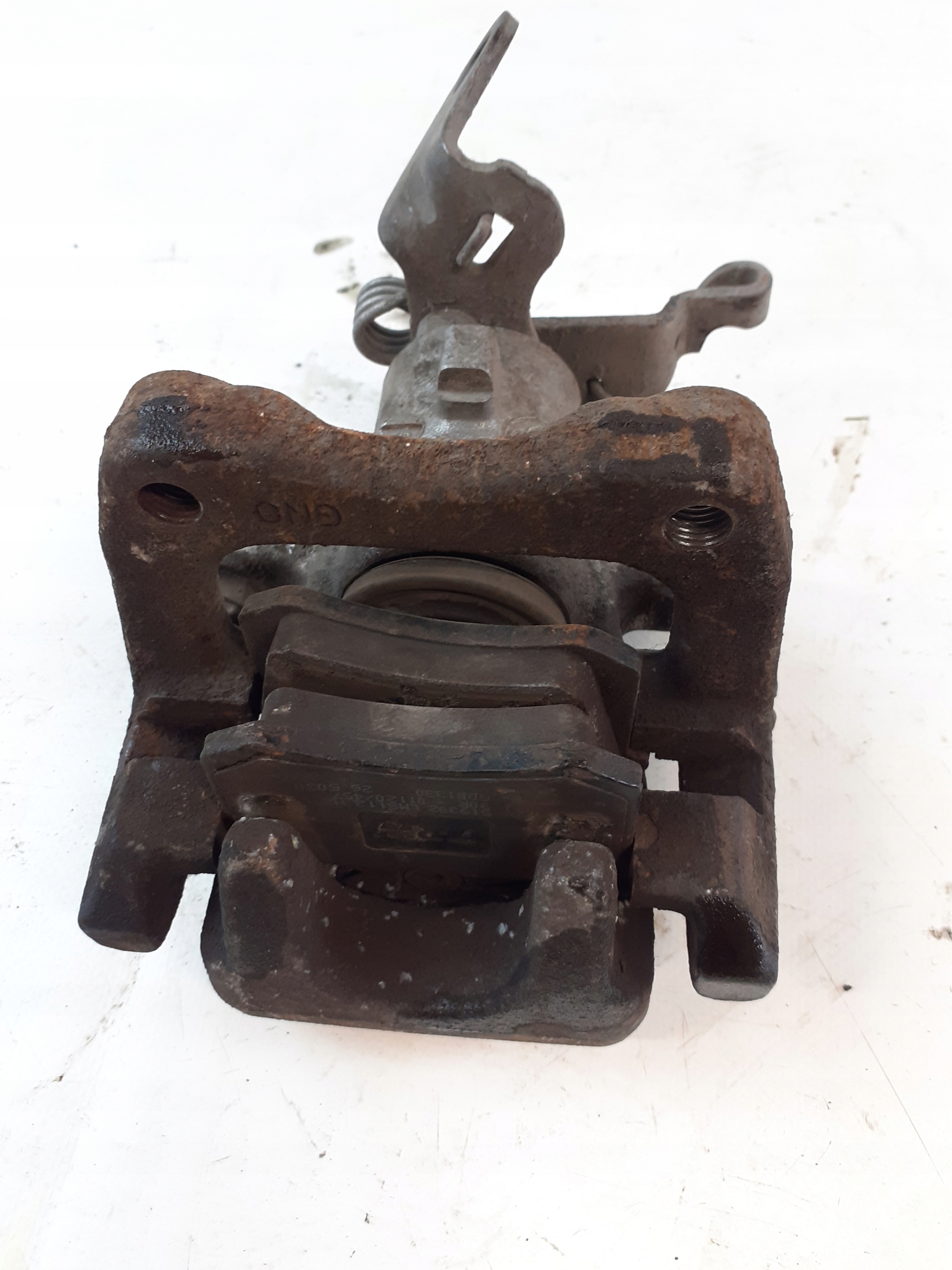 Skoda Octavia III caliper left rear part