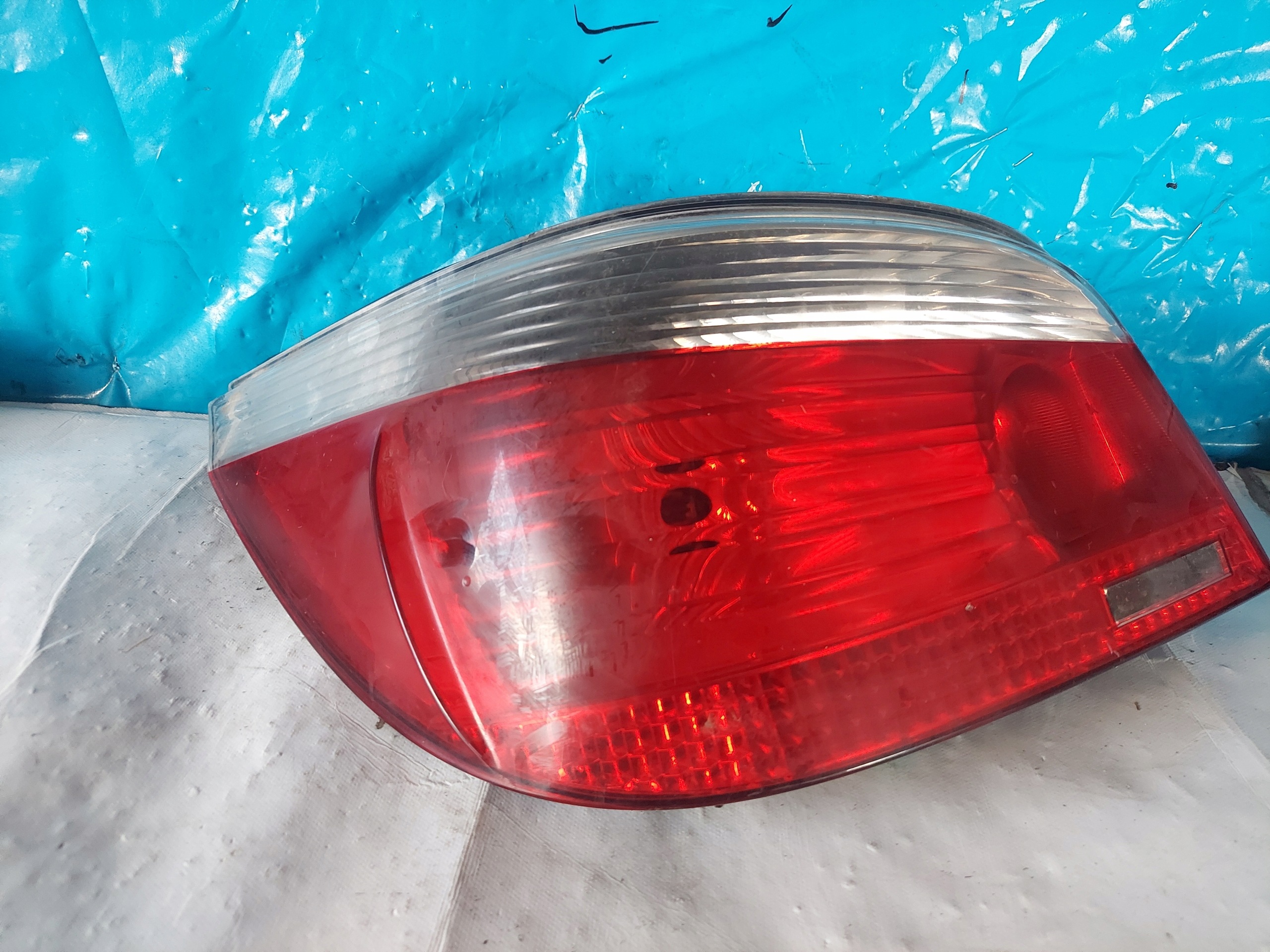 light BMW E60 sedan 6910767 left rear part