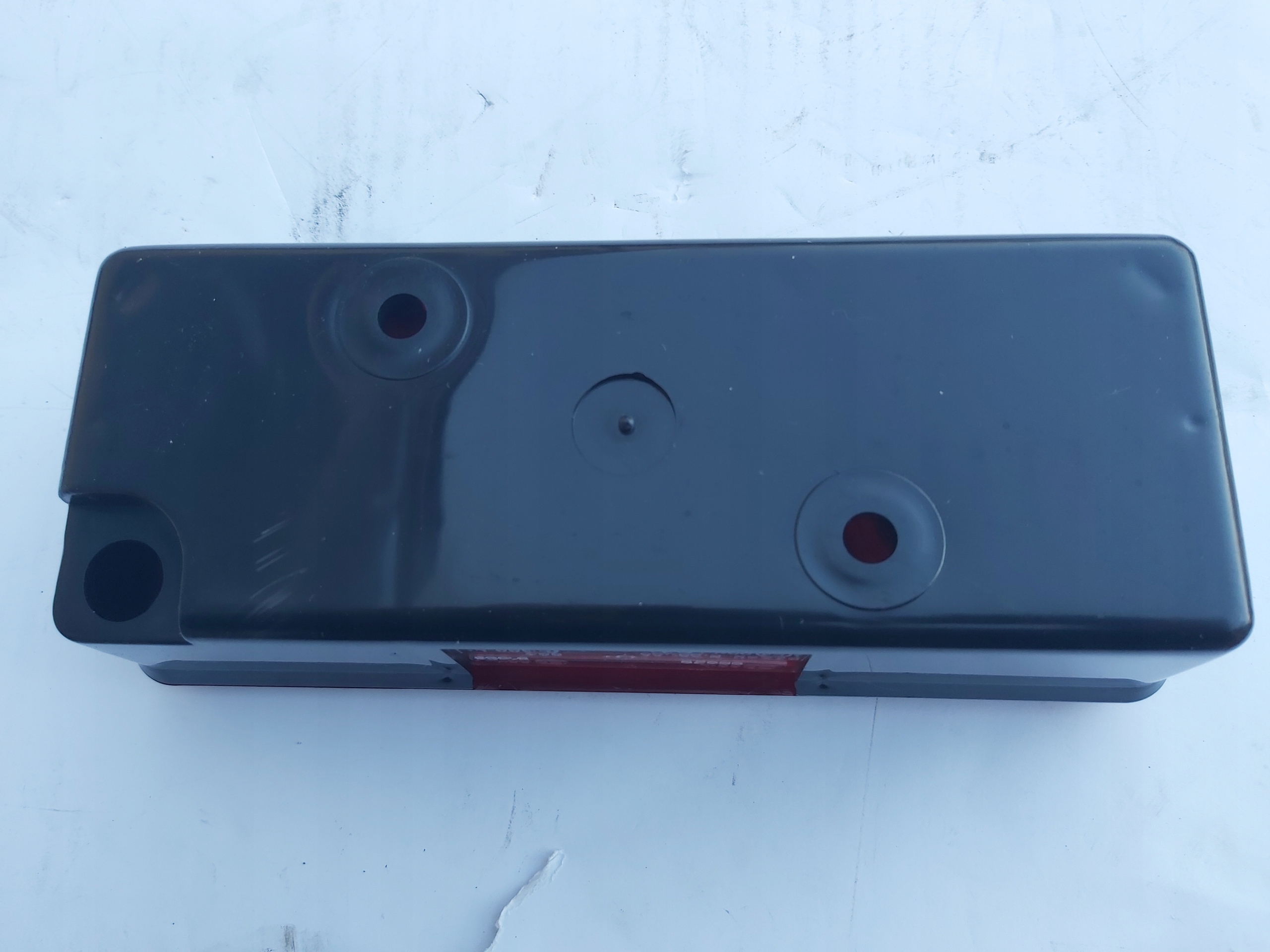 LAMPA TYLNA IFA W50 - LEWA - Z PODŚWIETLENIEM TABLICY REJ. Producent części GMP