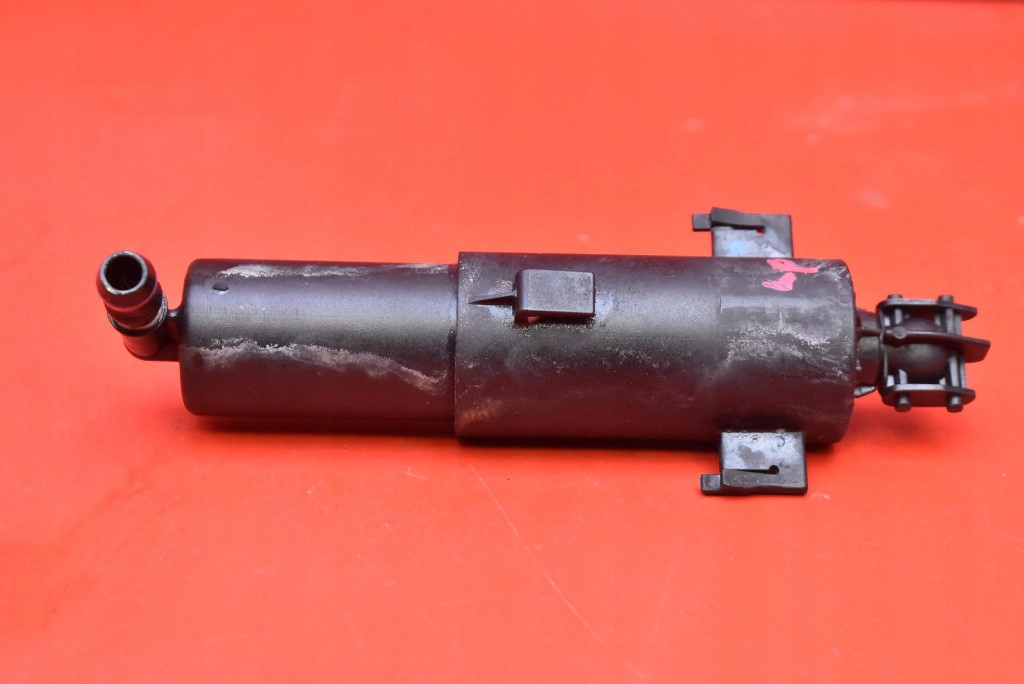 washer REFLEKTOROW left 7179311-04 BMW E90 E91 04-10