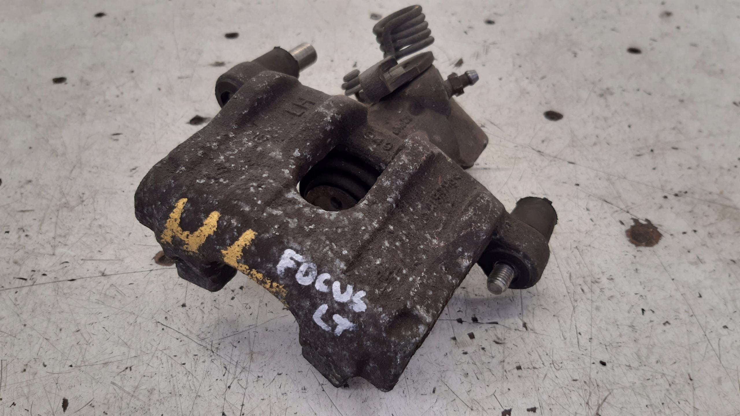 třmen levý záď Ford MK1