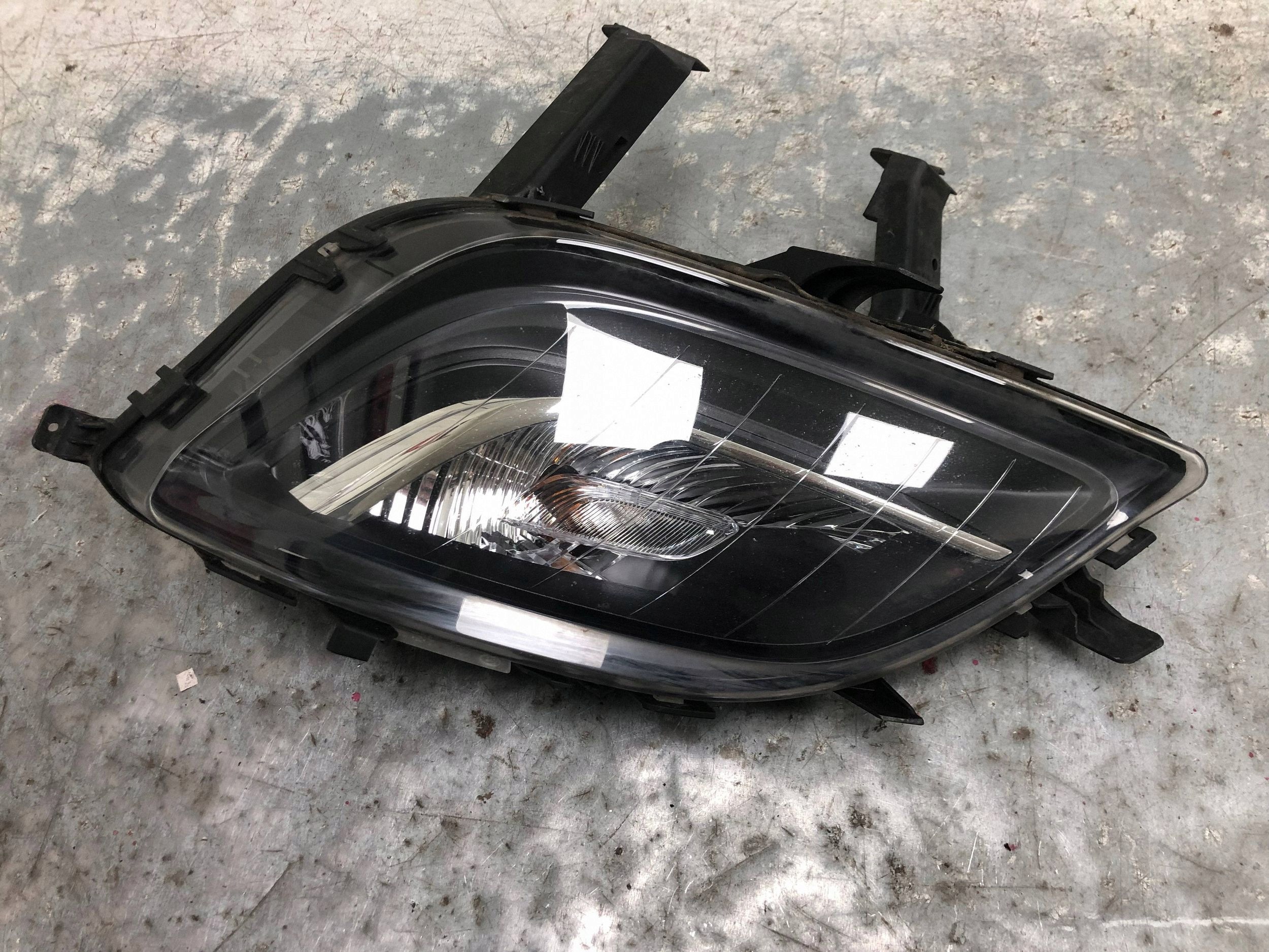 fog light left front OPEL ASTRA J KOMBI 13264641