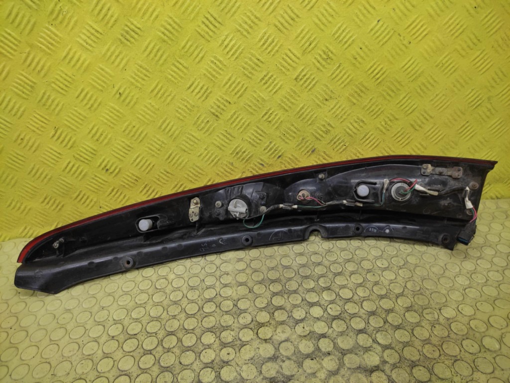 MITSUBISHI LANCER VII light left rear part