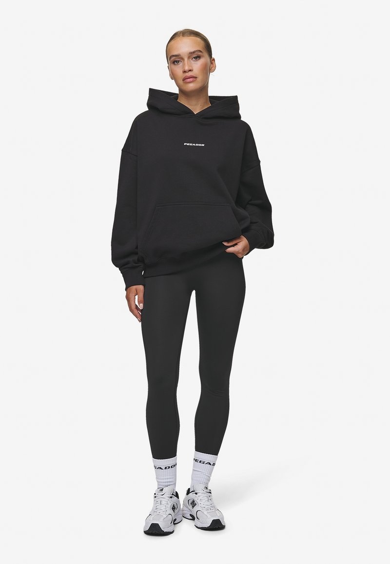 Černé dlouhé legíny s vysokým pasem Pegador Xs