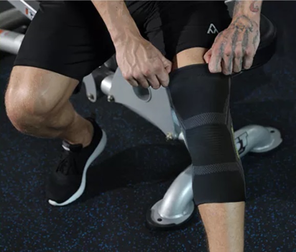 STABILIZATOR KOLANA ORTEZA OPASKA NA KOLANO ŚCIĄGACZ Marka bez marki