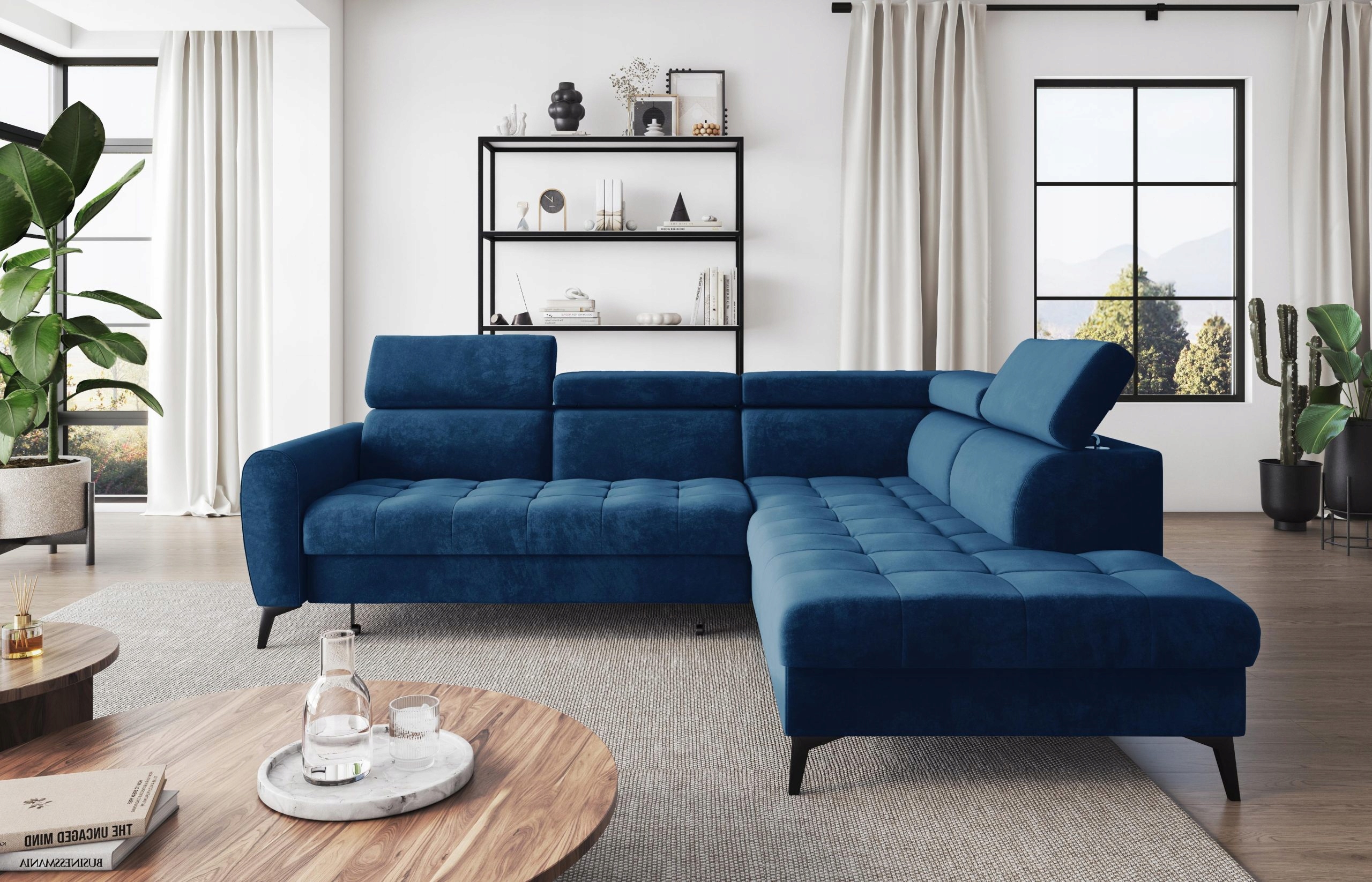 Pravý rohová sedací souprava modrý Bjorn L, rozkládací na pružinách s puntíky.