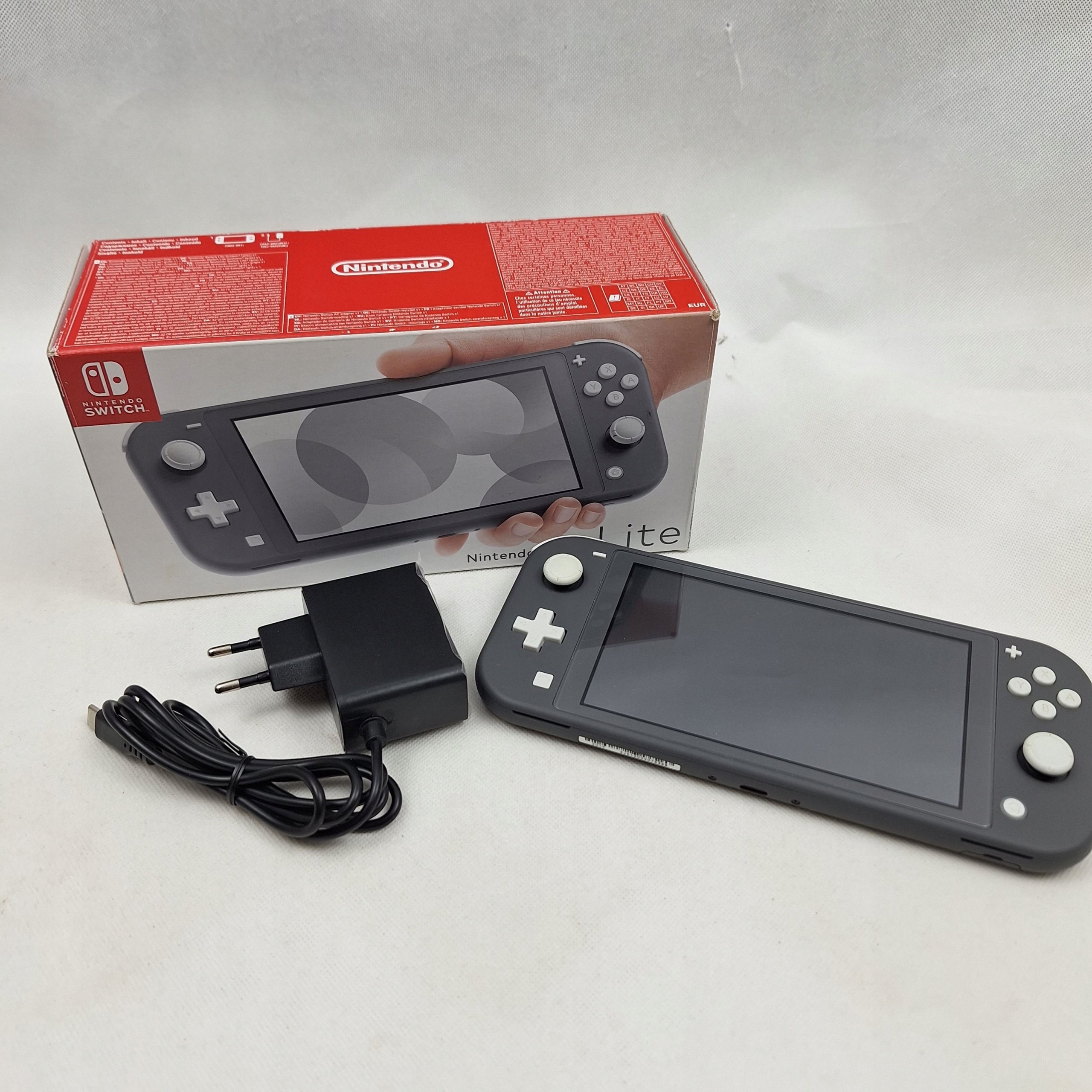 MEGA ZESTAW KONSOLA NINTENDO SWITCH LITE GRAY SZARY HDH-001 + ETUI + GRA Komunikacja Bluetooth NFC Wi-Fi