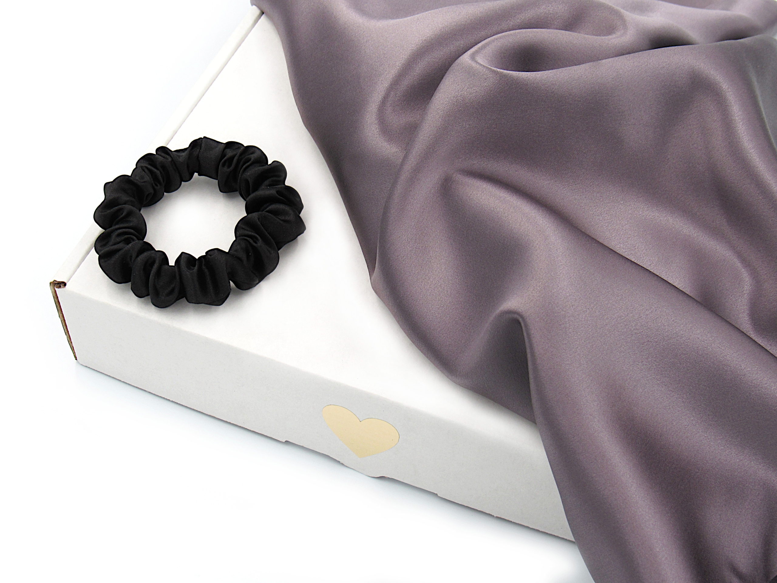 

Jedwabna poszewka 100%, 50x60 Szara gumka