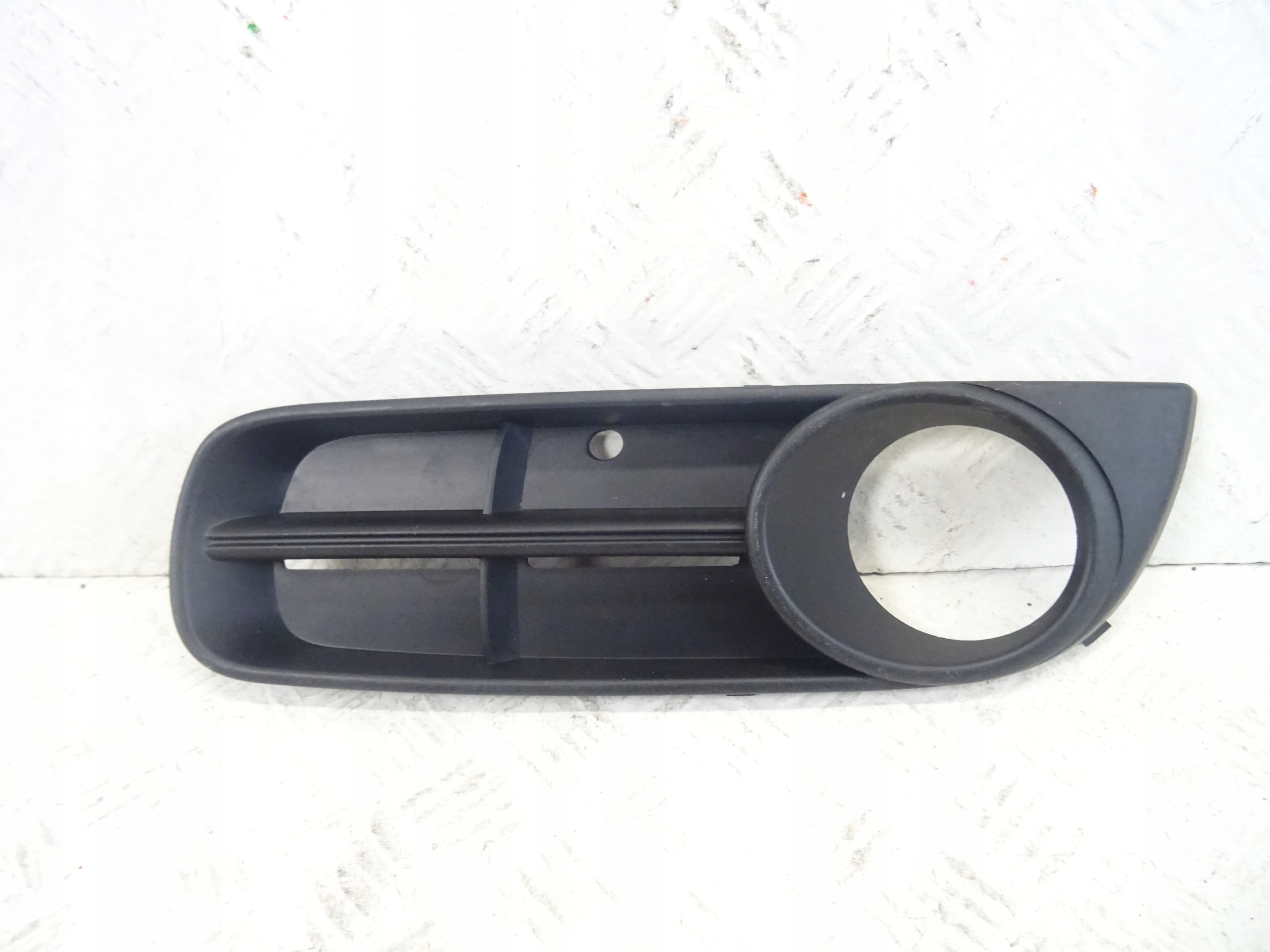 grid of a bumper front front left SKODA FABIA II ROOMSTER 5J0853665