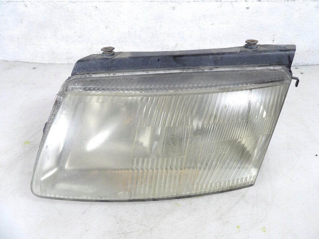 VW PASSAT B5 96-00 REFLEKTOR left H7 EU 147425-00