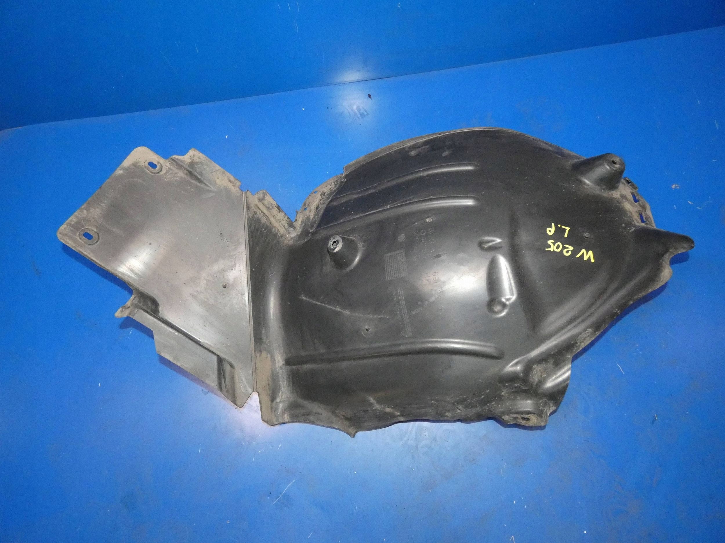 MERCEDES C KLASA W205 mudguard left front part rear