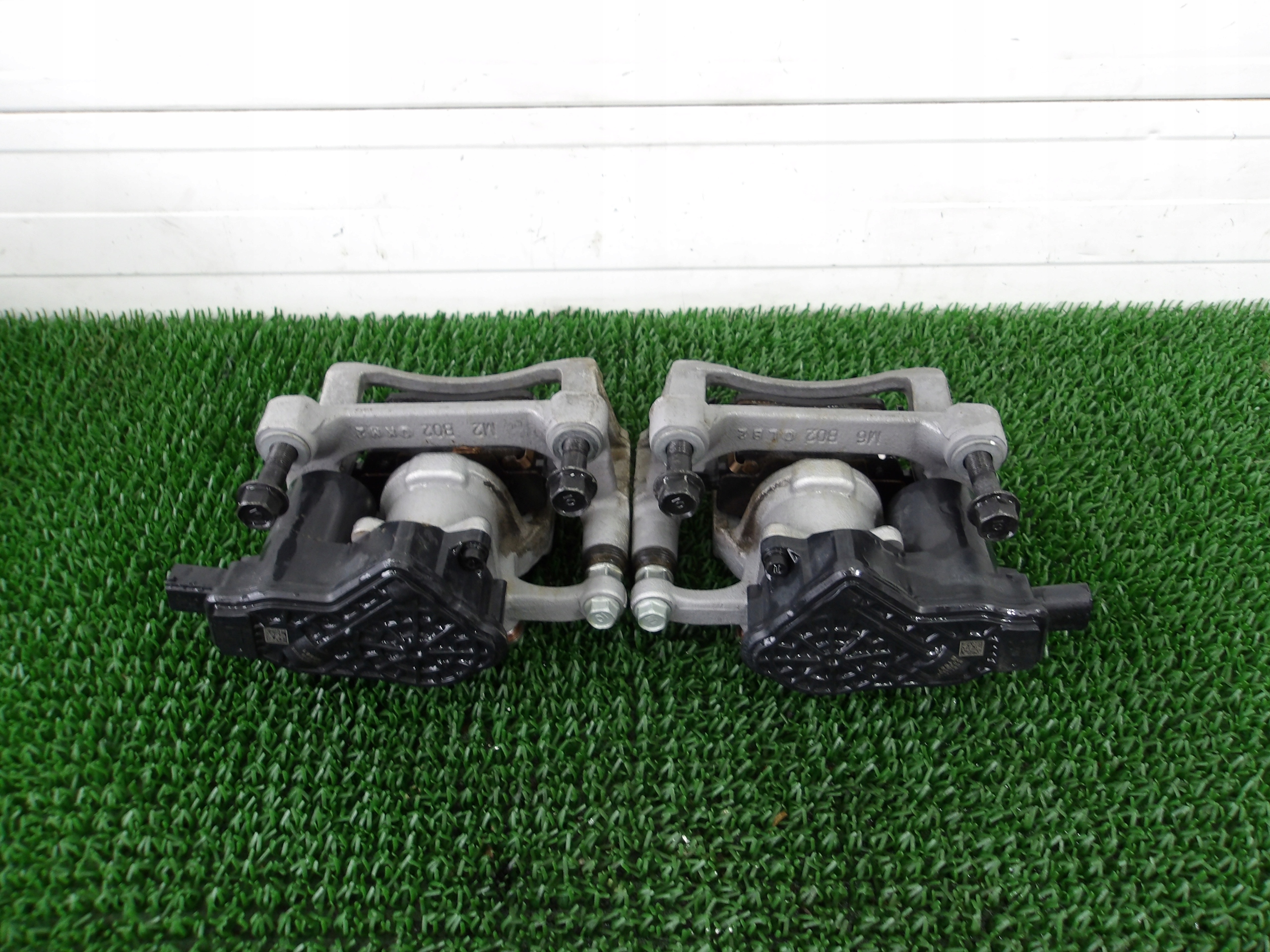 KIA SORENTO IV 20- caliper rear left rear part OE