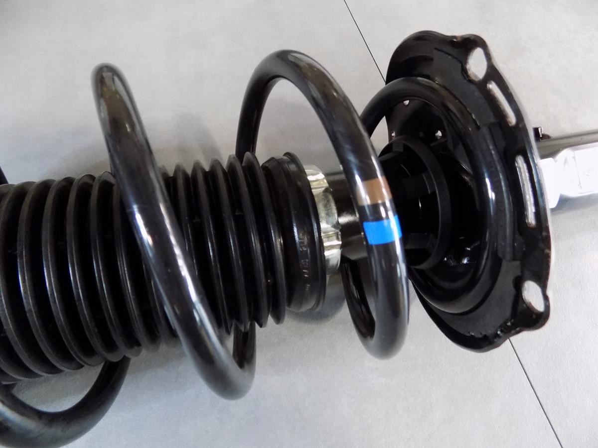 VW GOLF VII shock absorber spring front 5Q0412014MG