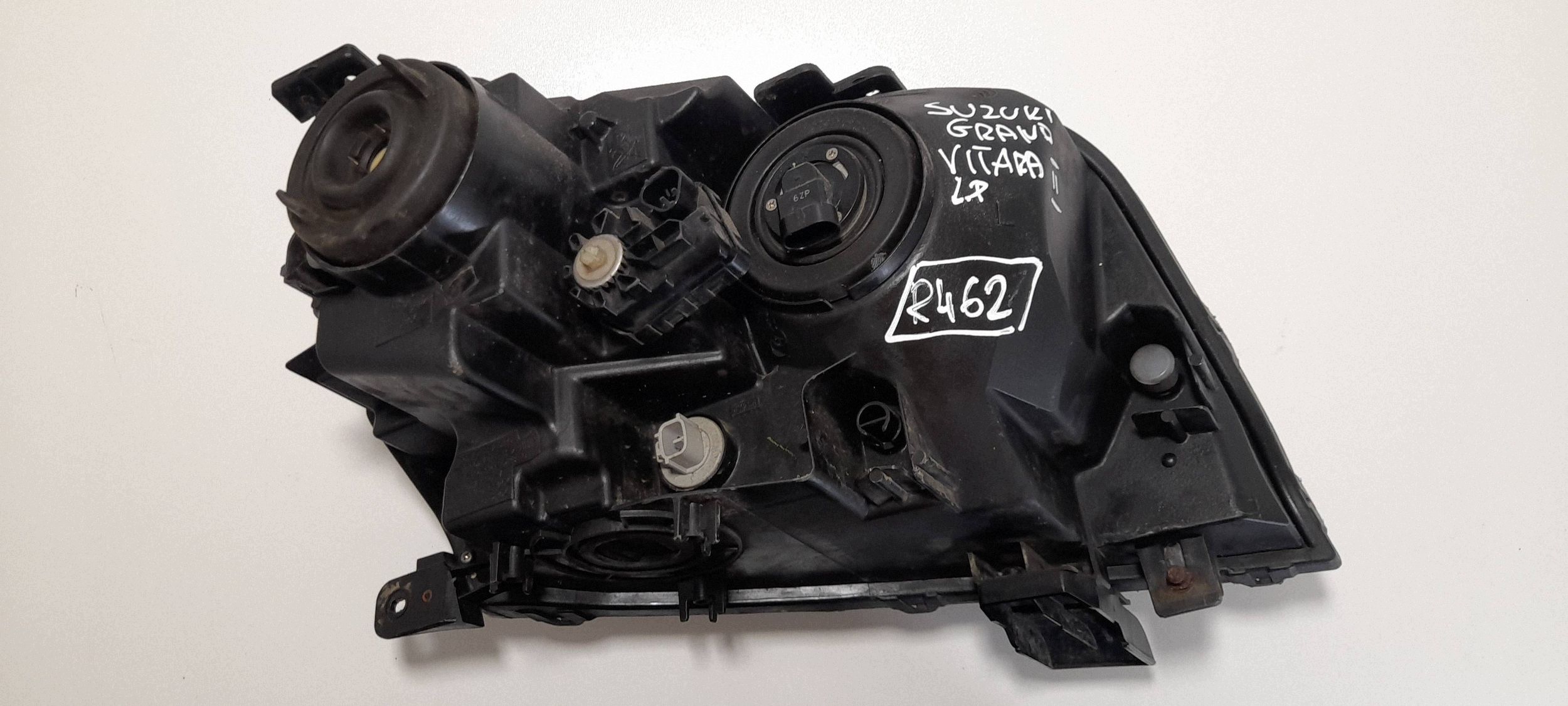 Suzuki Grand Vitara II Reflektor left 10059083 (R462)