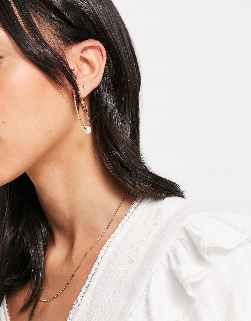 TEKSTUROWANE OKRĄGŁE KOLCZYKI W KOLORZE ZŁOTA Marka Inna marka