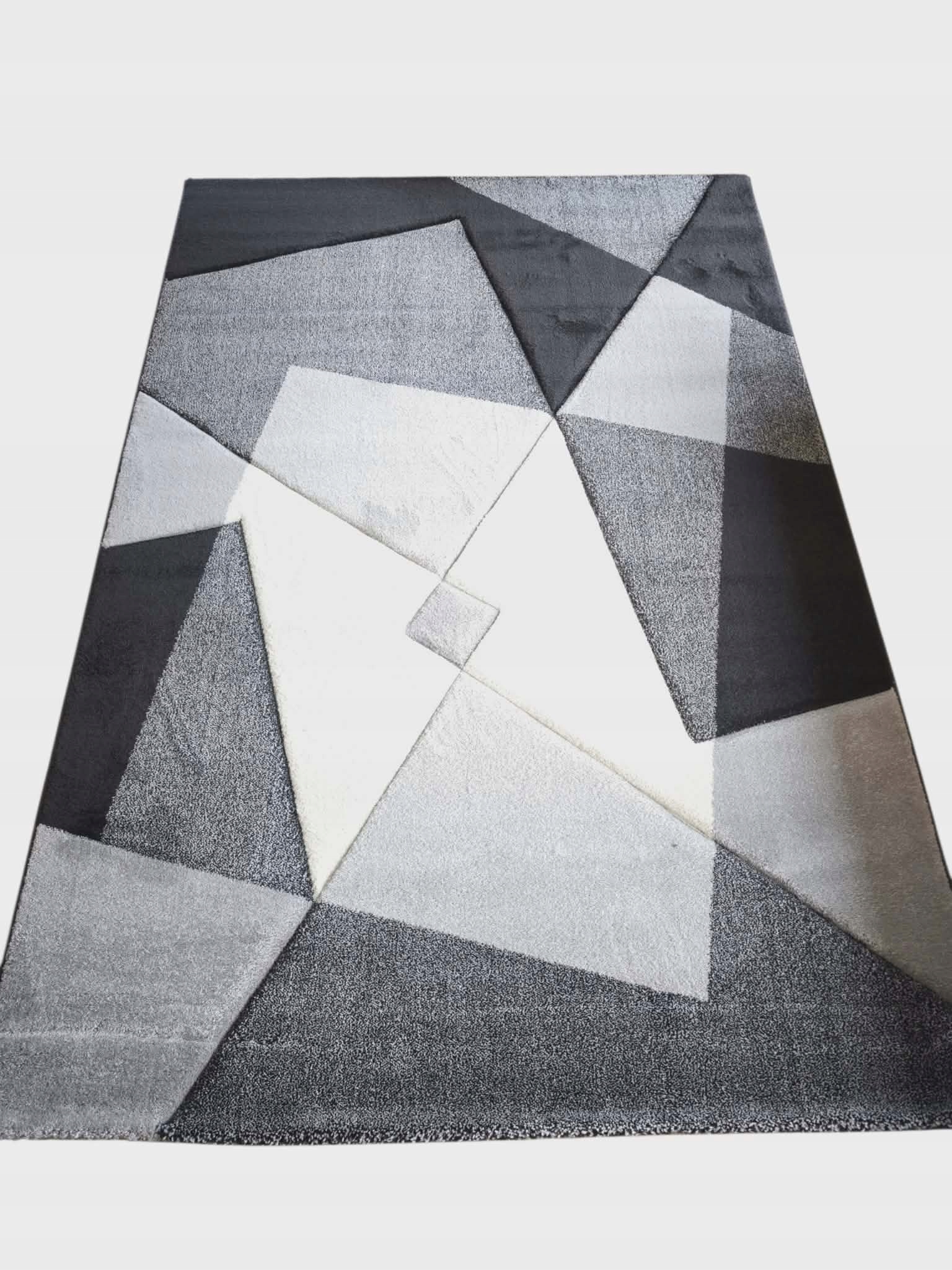 Moderný koberec do obývačky 160 x 230 cm, šedý, čierno-krémový 3D vzor