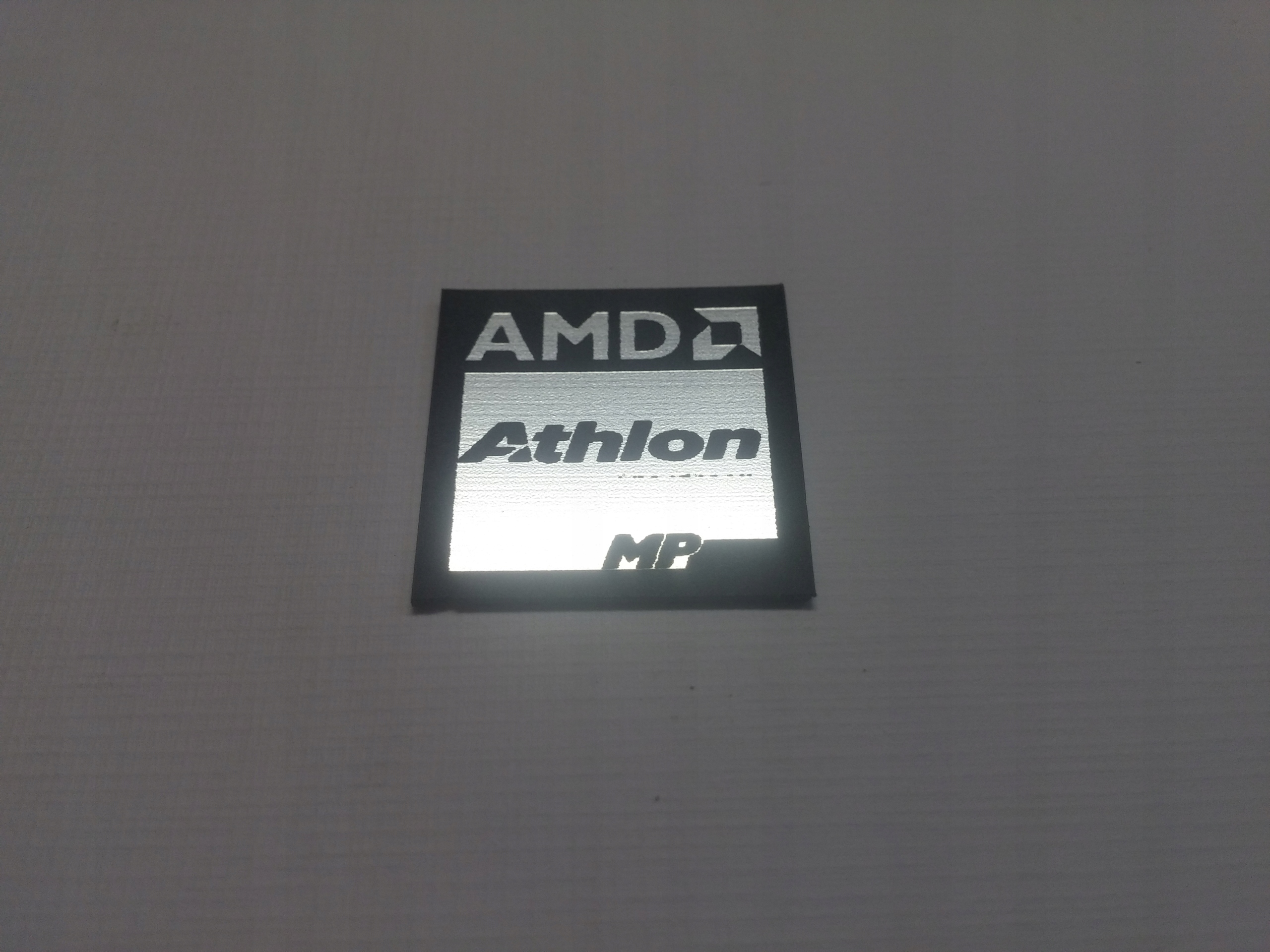 

Amd Athlon naklejka emblemat 20 x 20 mm *srebrna