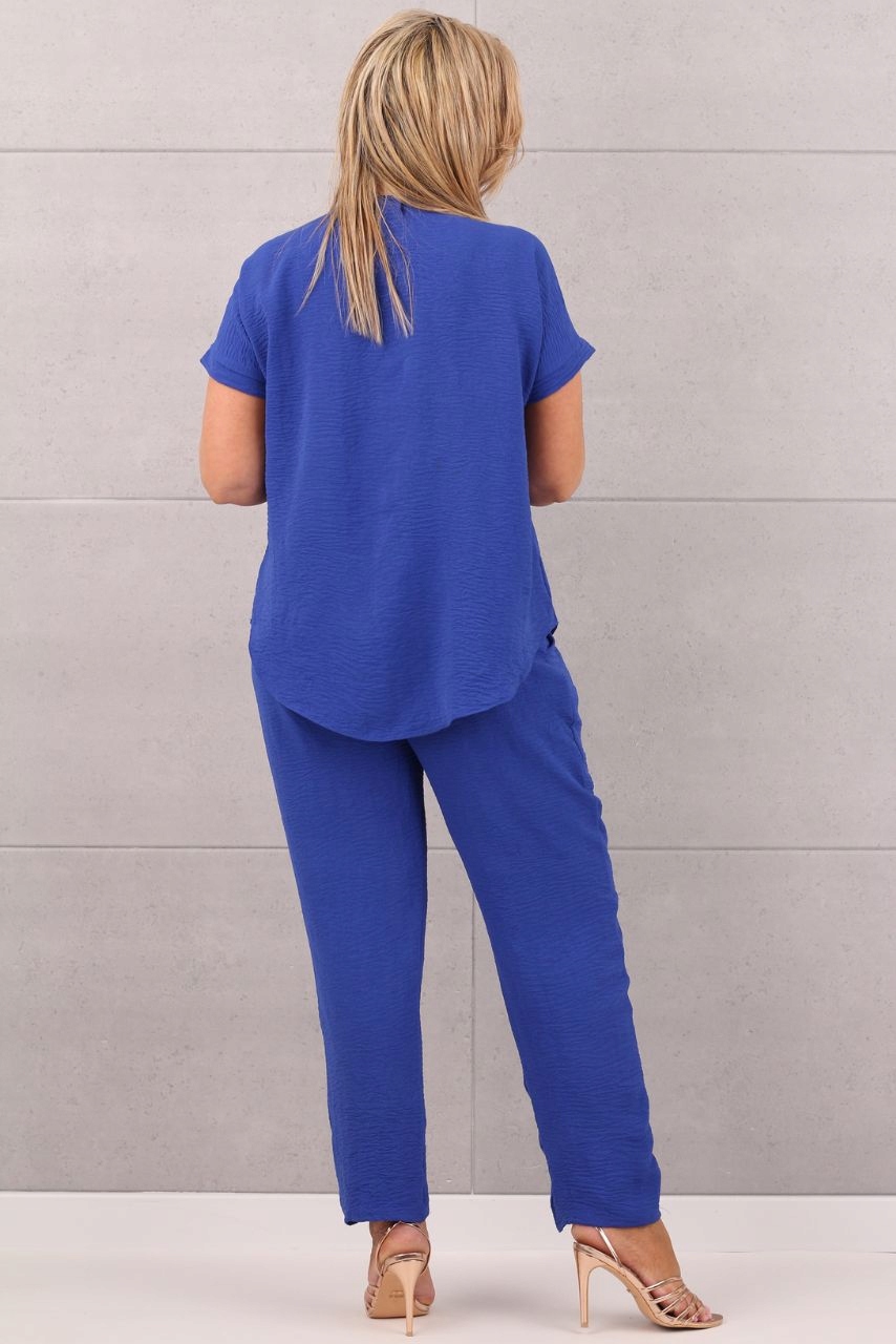 ELEGANCKI KOMPLET DAMSKI DUŻE ROZMIARY POLSKI PRODUCENT BLUZKA I SPODNIE Rozmiar 42