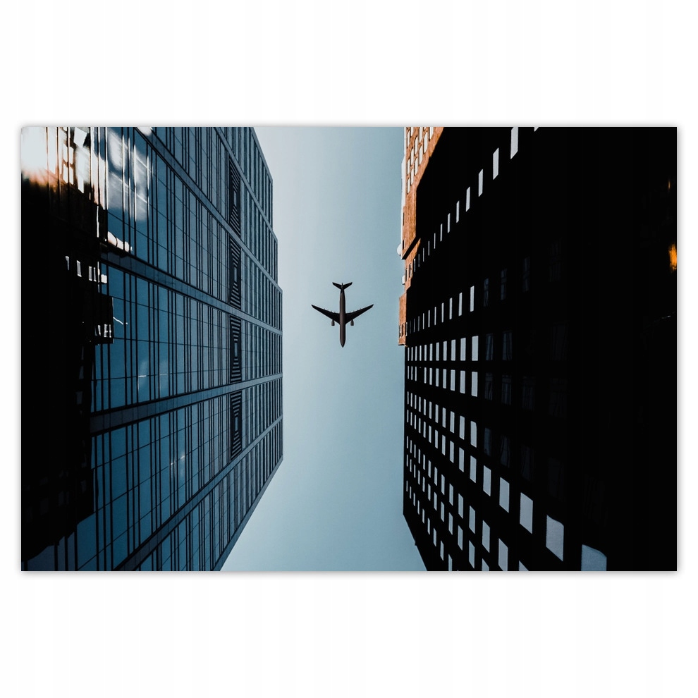 

Naklejki 185x125 Samolot między budynkami