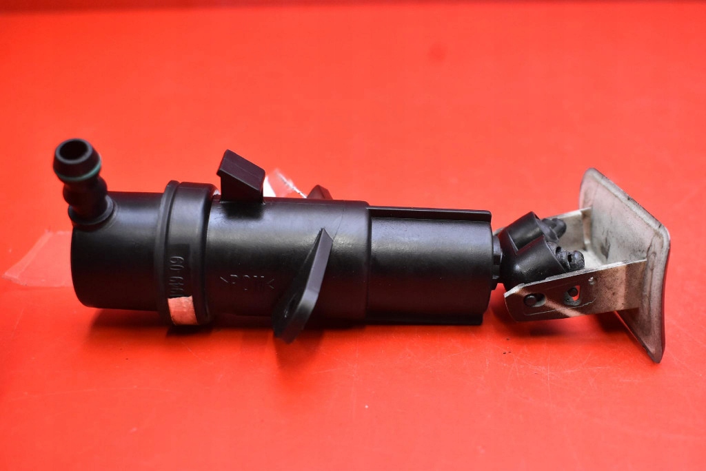 washer REFLEKTOROW left BMW X3 E83 LIFT 06-10
