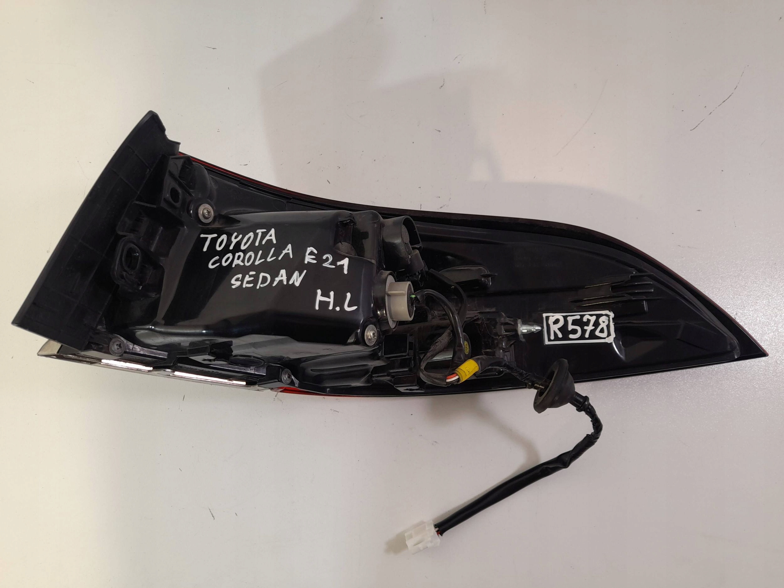 Toyota Corolla E21 sedan light rear left 8156002D1100 (R578)