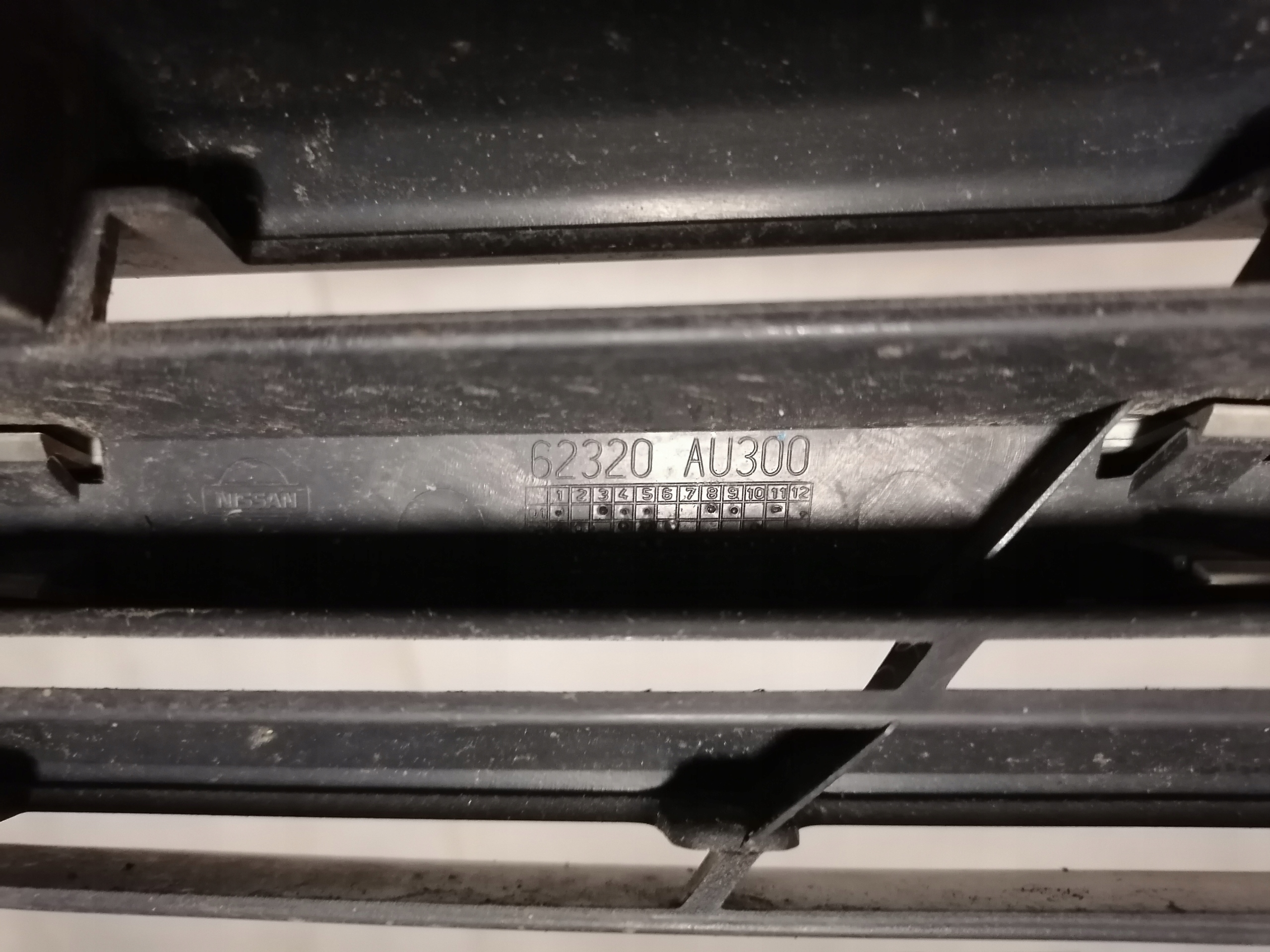 PRIMERA P12 Grill der Stoßstange rechts 62320AU300