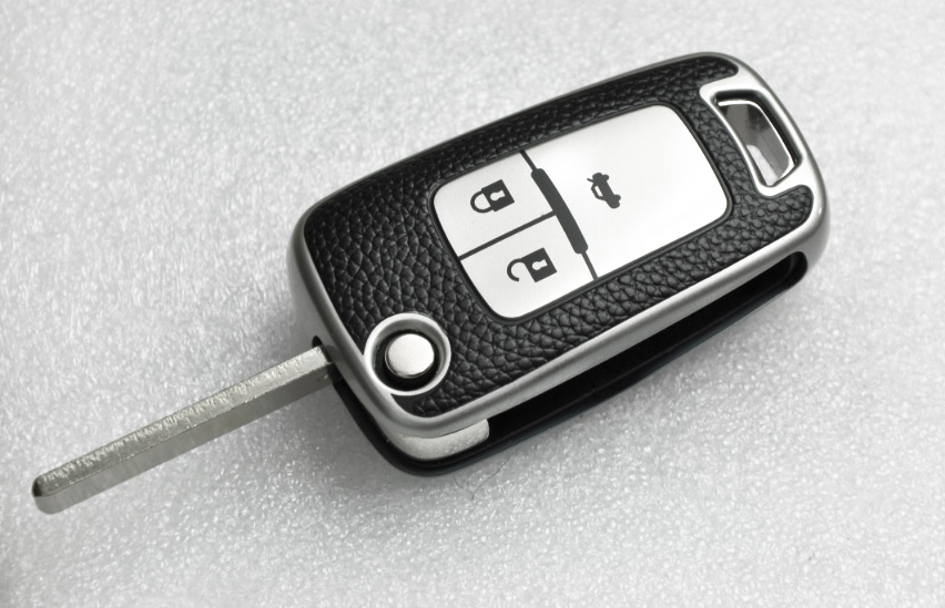 OPEL INSIGNIA ASTRA J ZAFIRA ETUI NA KLUCZYK PILOT Numer katalogowy części OPEL/CHEVROLET srebrne ETUI SILIKONOWE