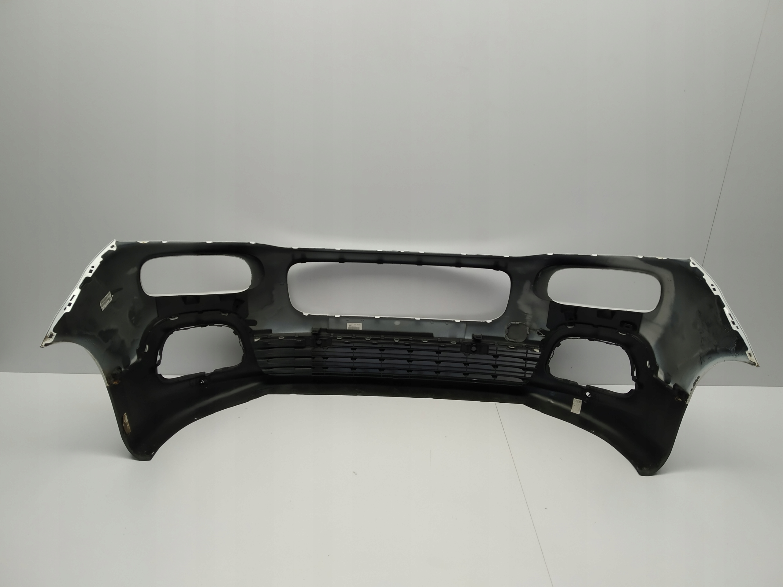 18r- Citroen Berlingo Multispace bumper front Bialy iv