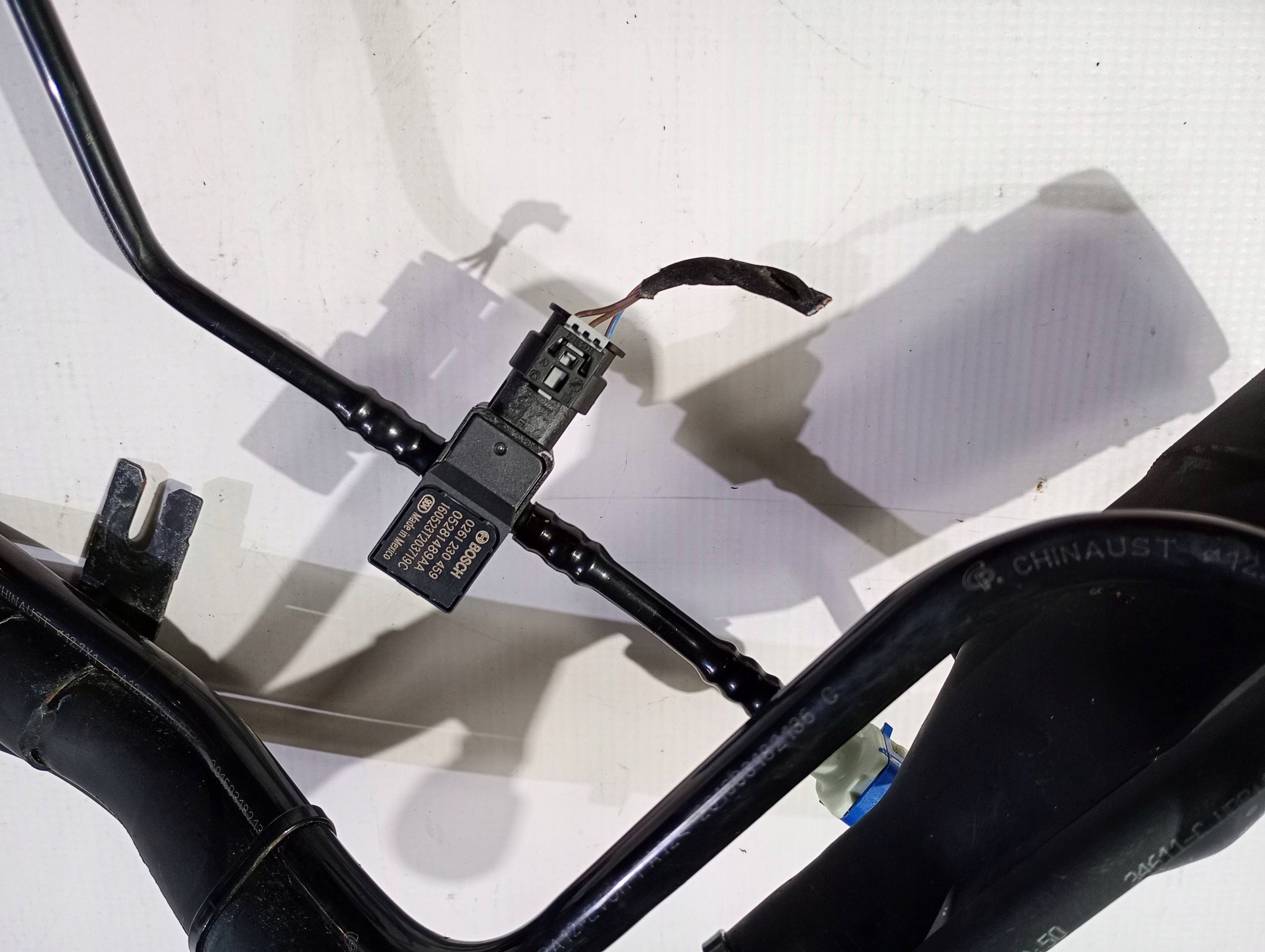 fuel tank door pipe Chrysler Pacifica 2017