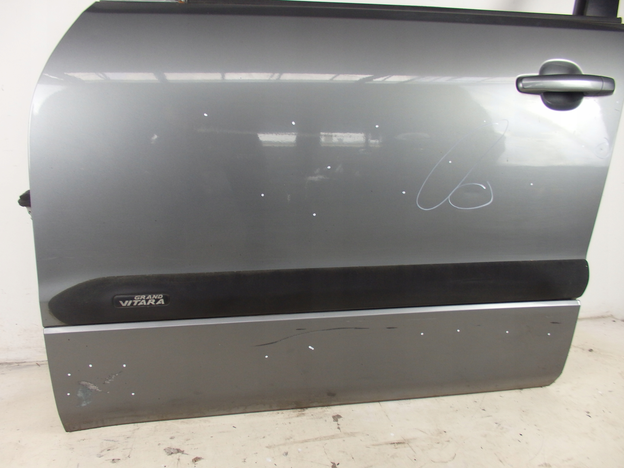 DRZWI LEWE PRZEDNIE PRZÓD SUZUKI GRAND VITARA II 06r ZDL Strona zabudowy przód - lewa