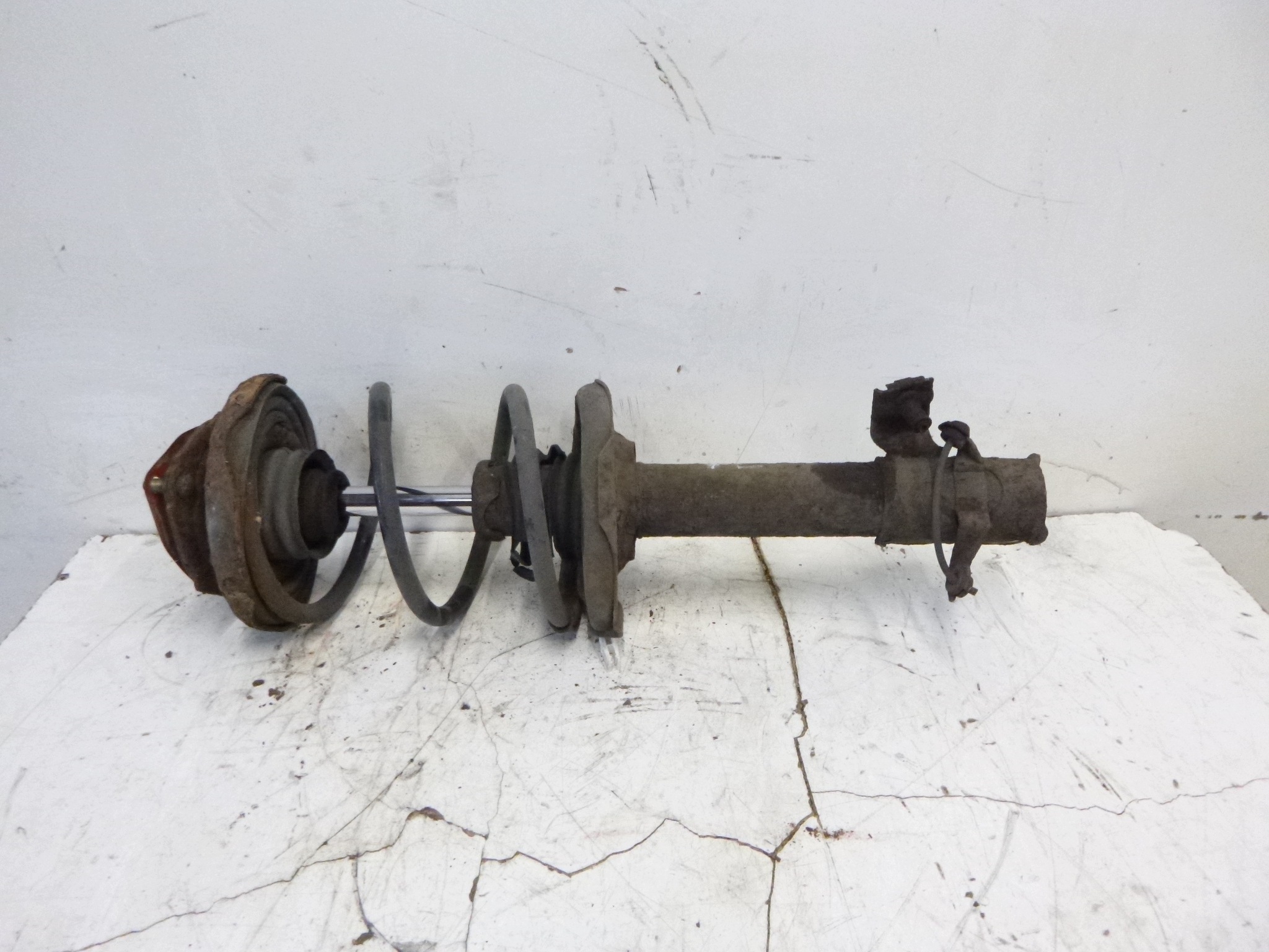 shock absorber front left McPherson Nissan X-Trail T30 2.2 2001-2007