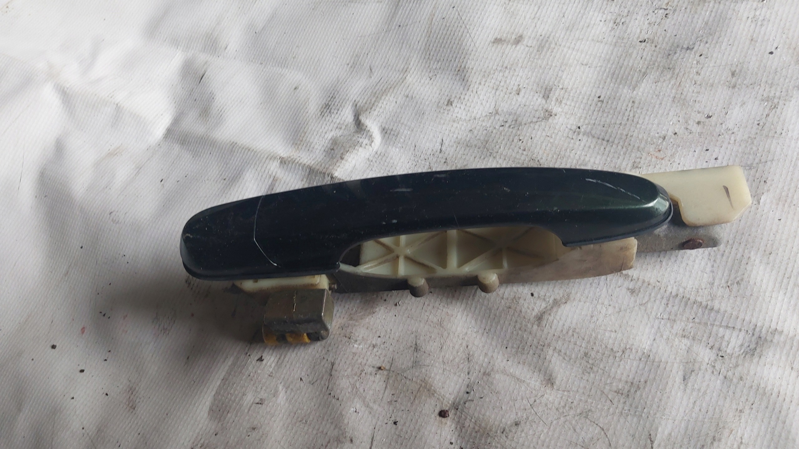 HYUNDAI TUCSON and 04-10 handle left rear part KOD LAKIERU NS