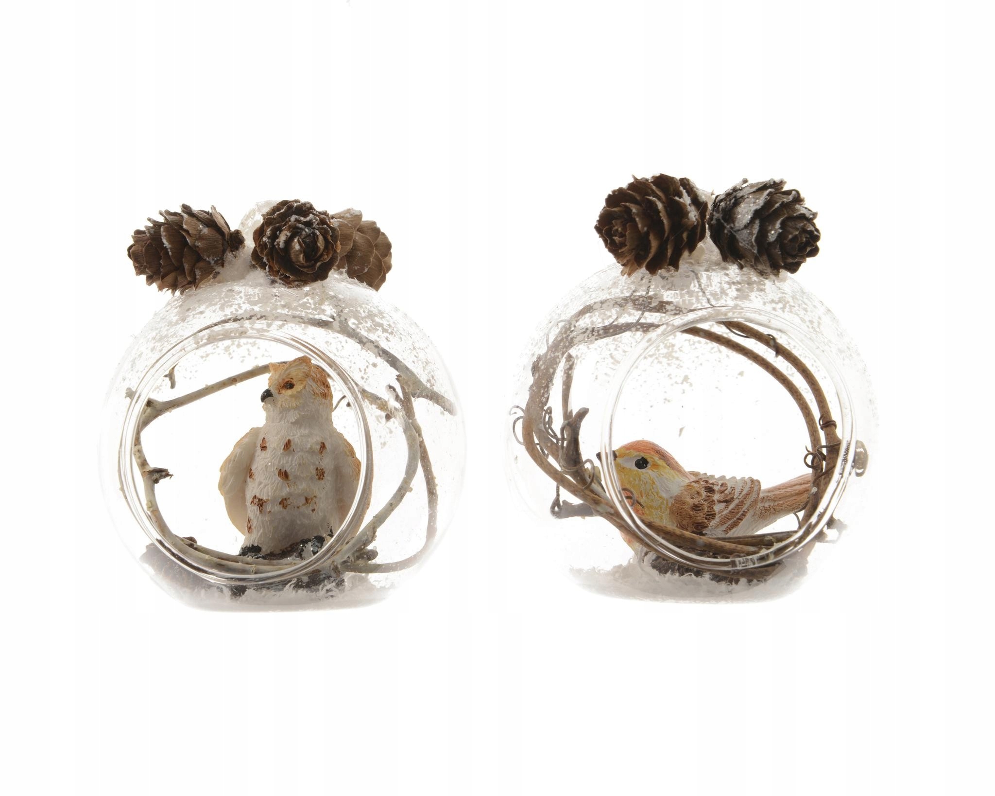 

Szklane bombki z figurkami w środku ptaki gałęzie