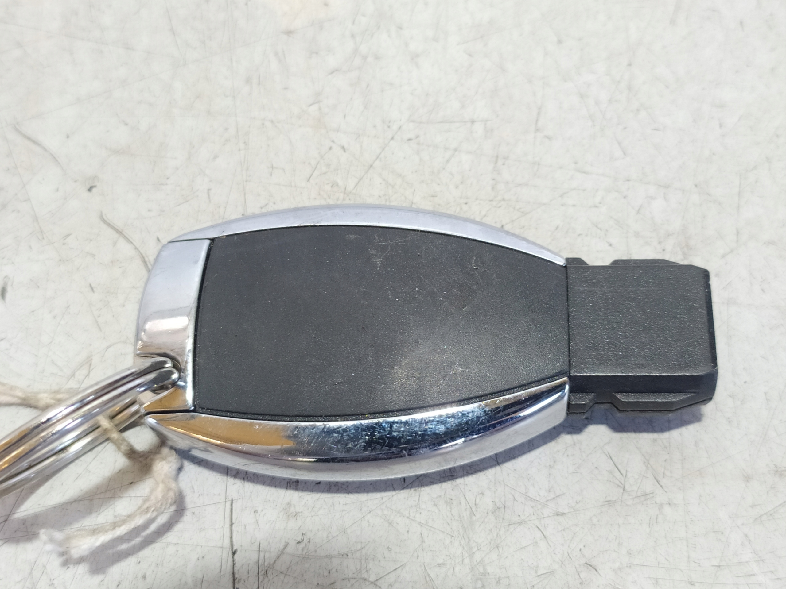 MERCEDES W207 KLUCZYK PILOT Producent części Mercedes-Benz OE