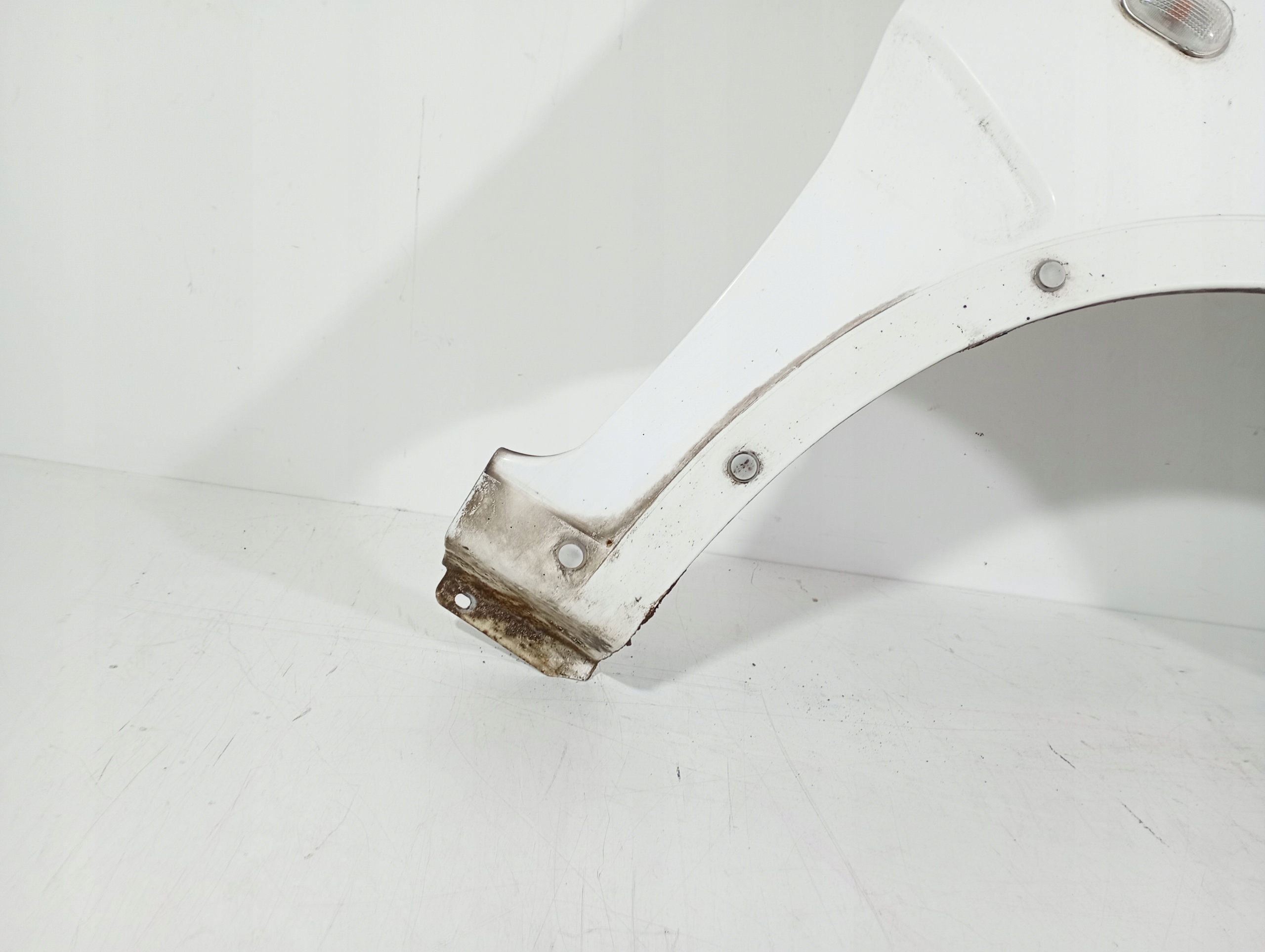 Suzuki IGNIS 2 II 00-06 fender right front front kod lakieru 26U