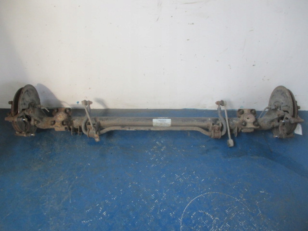 VW CADDY III LIFT TYLNA BELKA OŚ TYŁ TARCZE ZACISK ABS