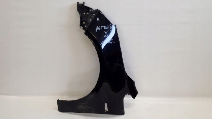 OPEL ASTRA IV BŁOTNIK LEWY PRZÓD