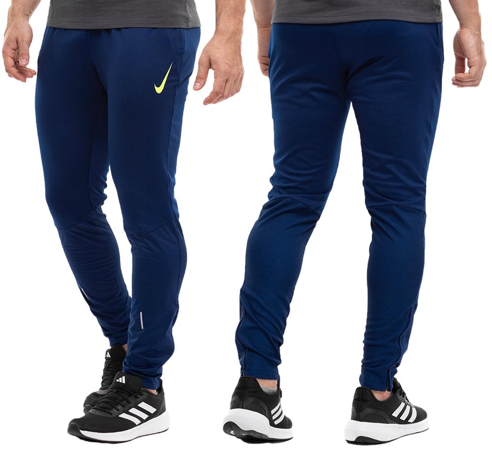 Nike pánské sportovní tréninkové fitness tepláky vel M